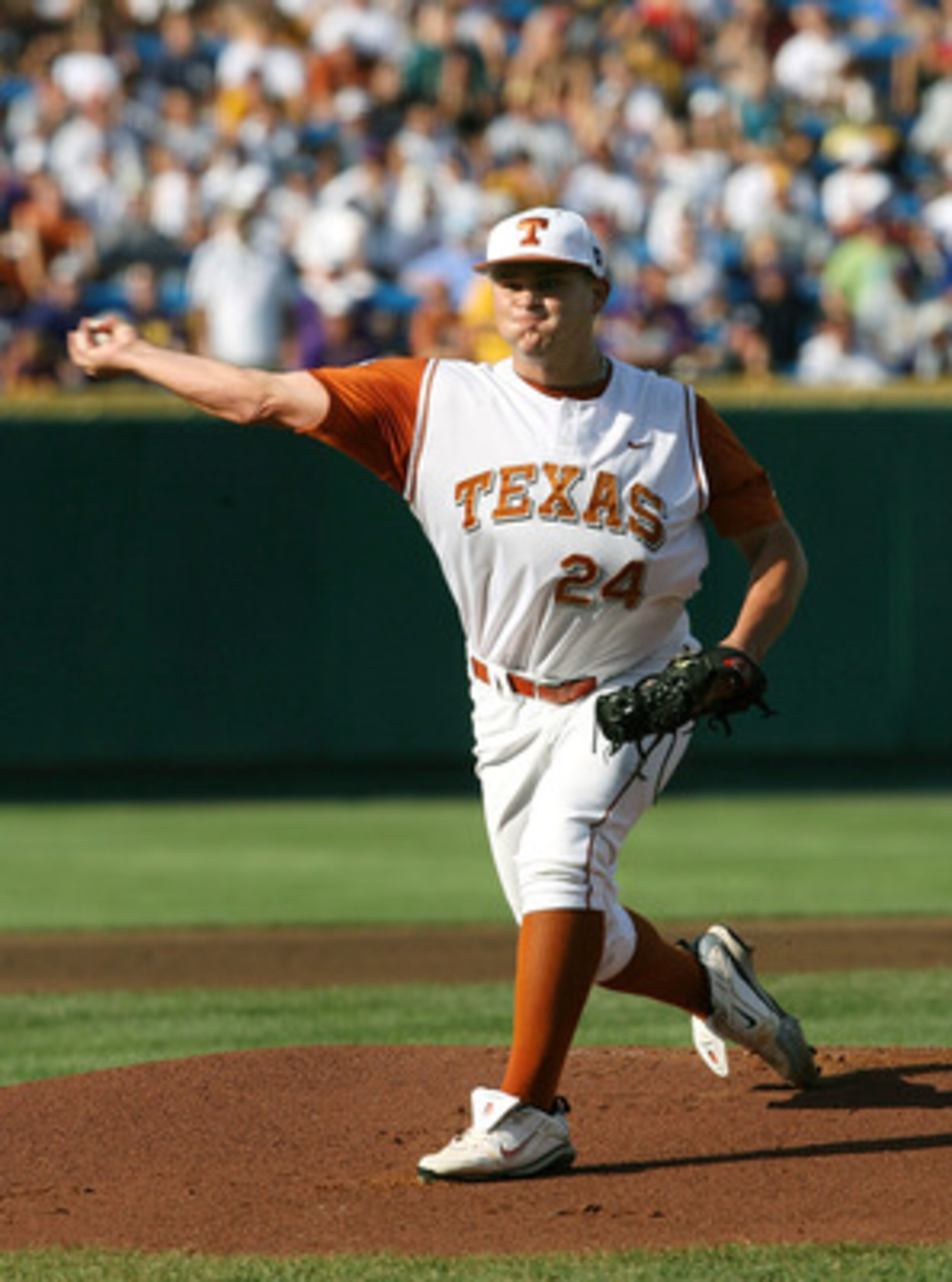 OMAHA, NE - JUNE 24:  Pitcher Cole Green #24 of the Texas Longhorns pitches against the Louisiana State University Tigers in the first inning during Game 3 of the 2009 NCAA College World Series at Rosenblatt Stadium on June 24, 2009 in Omaha, Nebraska. (P