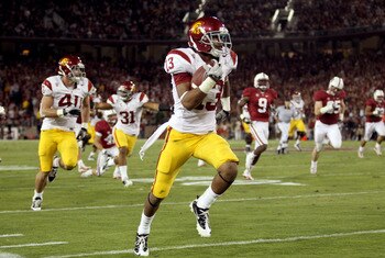 PALO ALTO, CA - OCTOBER 09:  Robert Woods #13 of the USC Trojans runs the ball in for a touchdown against the Stanford Cardinal at Stanford Stadium on October 9, 2010 in Palo Alto, California.  (Photo by Ezra Shaw/Getty Images)