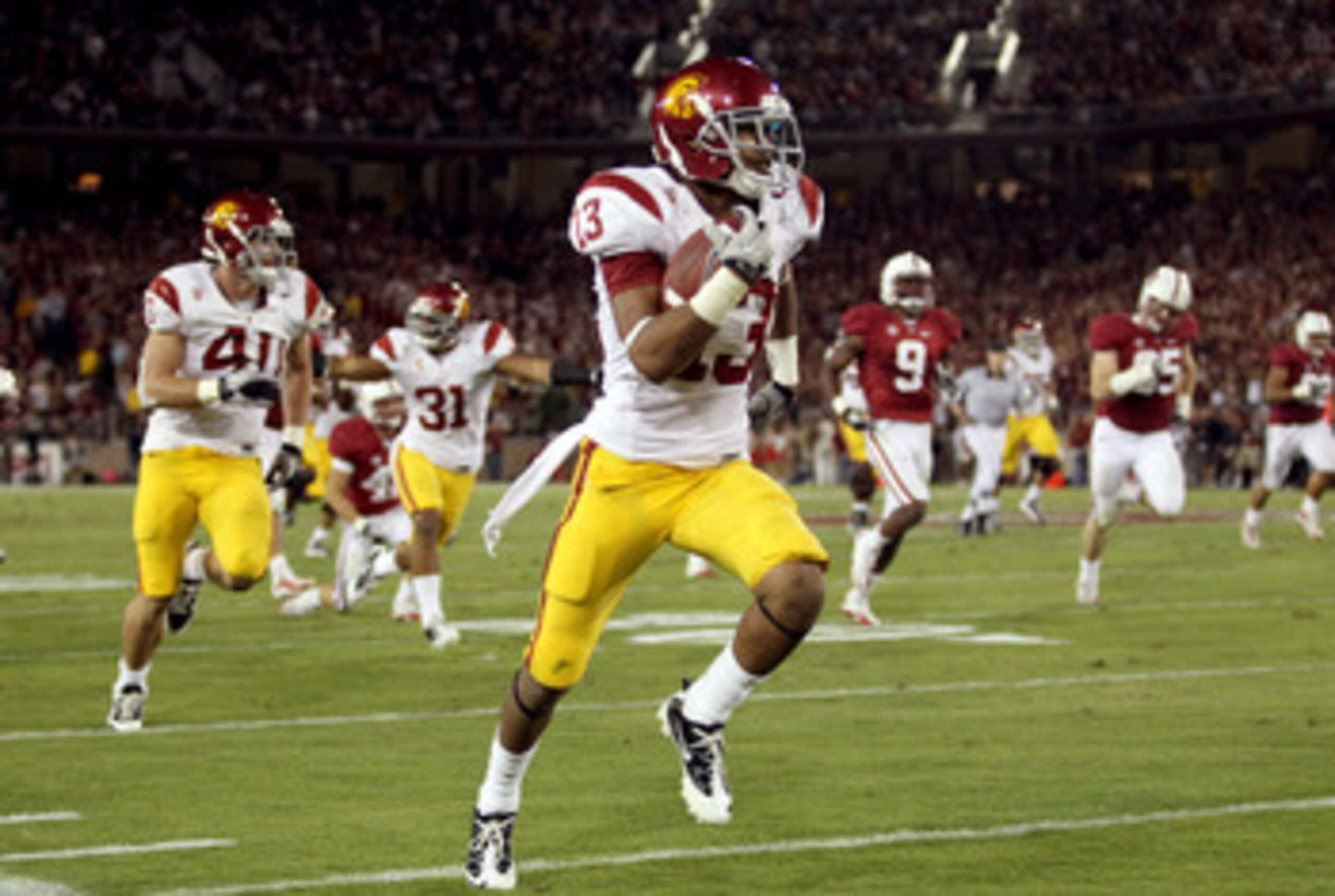 PALO ALTO, CA - OCTOBER 09: Robert Woods #13 of the USC Trojans runs the ball in for a touchdown against the Stanford Cardinal at Stanford Stadium on October 9, 2010 in Palo Alto, California. (Photo by Ezra Shaw/Getty Images) PALO ALTO, CA - OCTOBER 09: Robert Woods #13 of the USC Trojans runs the ball in for a touchdown against the Stanford Cardinal at Stanford Stadium on October 9, 2010 in Palo Alto, California. (Photo by Ezra Shaw/Getty Images)