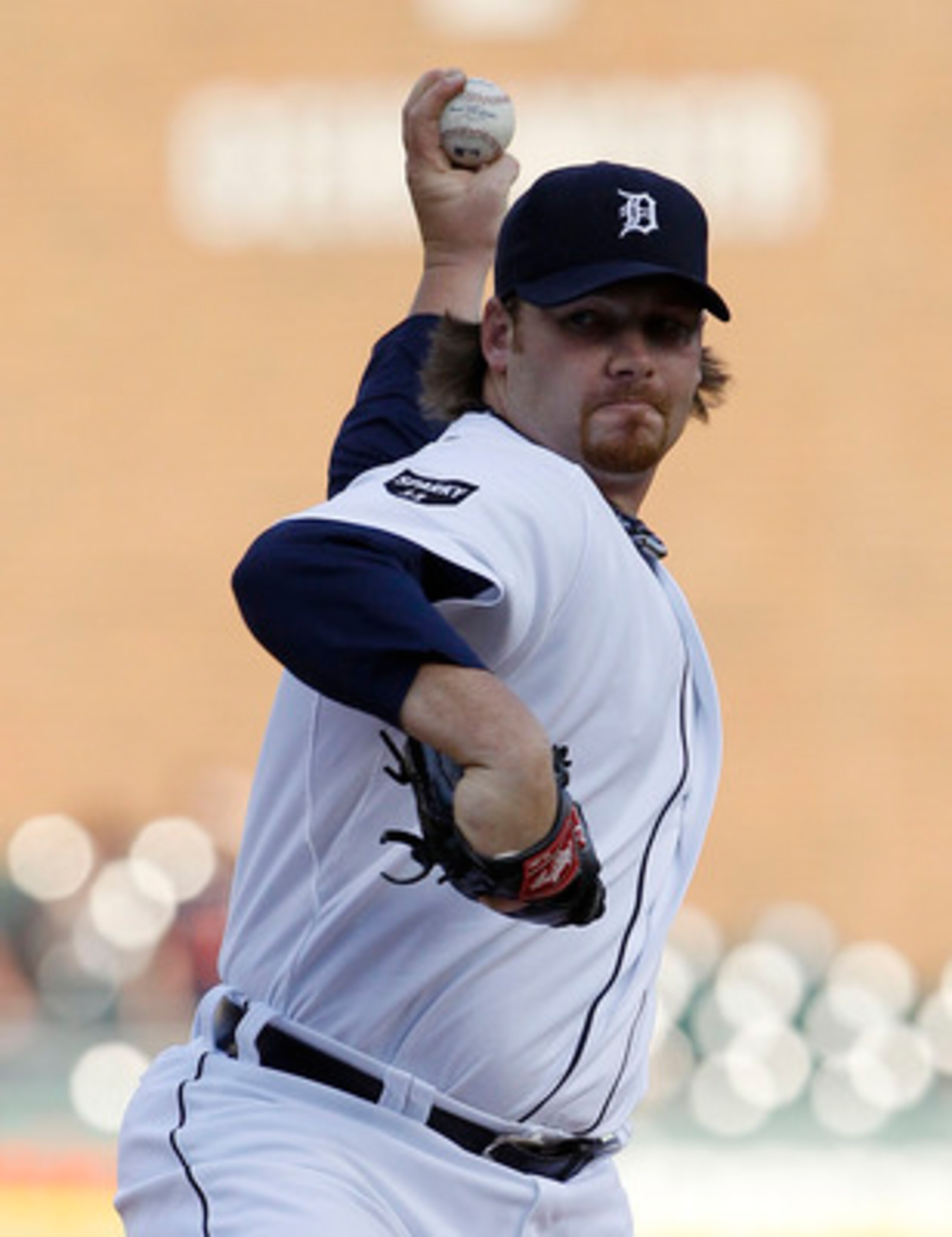 DETROIT - APRIL 26:  Phil Coke #40 of the Detroit Tigers pitches in the second inning during the game against the Seattle Mariners at Comerica Park on April 26, 2011 in Detroit, Michigan. The Mariners defeated the Tigers 7-3.  (Photo by Leon Halip/Getty I