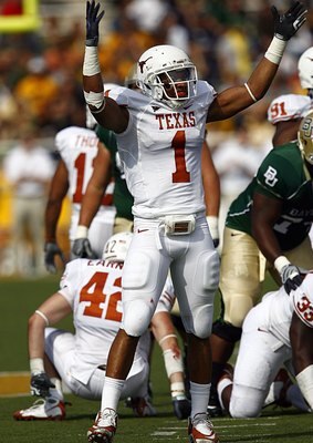 WACO, TX - NOVEMBER 14:  Linebacker Keenan Robinson #1 of the Texas celebrates after sacking quarterback Nick Florence #11 of the Baylor Bears in the second half on November 14, 2009 at Floyd Casey Stadium in Waco, Texas.  The Longhorns beat the Bears 47-