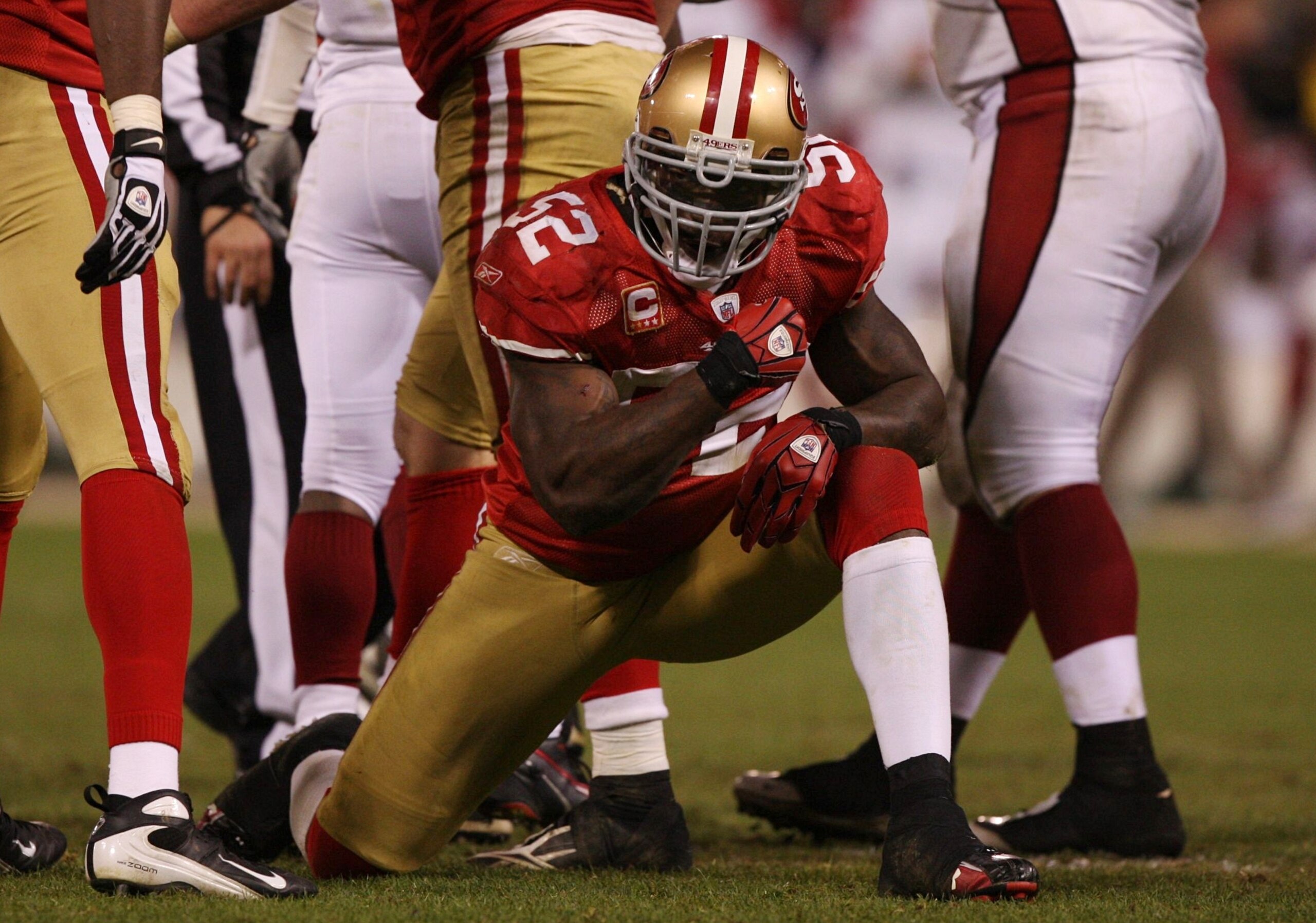 SAN FRANCISCO - DECEMBER 14:  Linebacker Patrick Willis #52 of the San Francisco 49ers reacts after sacking Kurt Warner #13 of the Arizona Cardinals at Candlestick Park on December 14, 2009 in San Francisco, California. (Photo by Jed Jacobsohn/Getty Image