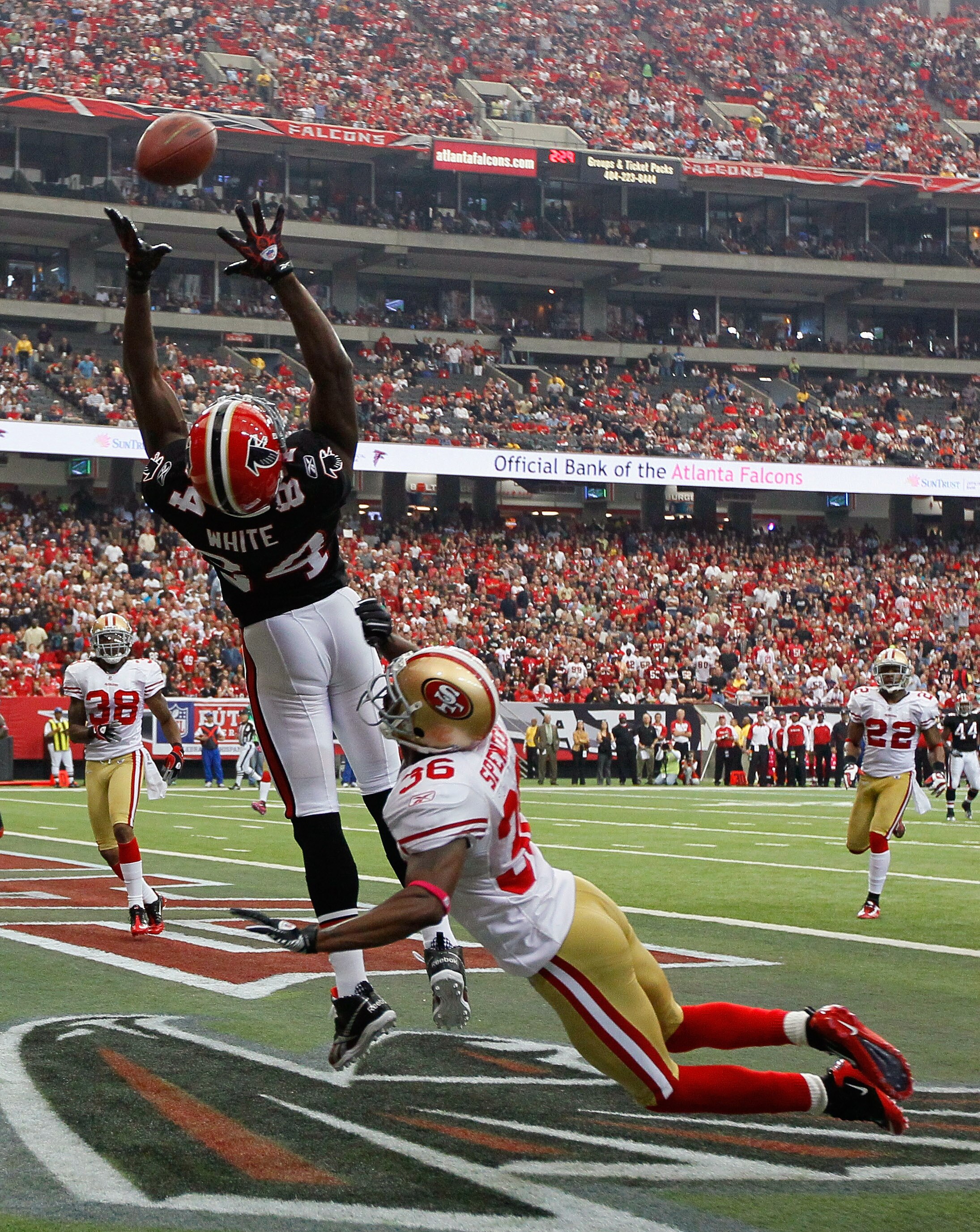 ATLANTA - OCTOBER 03:  Roddy White #84 of the Atlanta Falcons fails to pull in this touchdown reception against Shawntae Spencer #36 of the San Francisco 49ers at Georgia Dome on October 3, 2010 in Atlanta, Georgia.  (Photo by Kevin C. Cox/Getty Images)