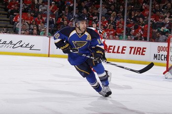 DETROIT, MI - MARCH 30:  Andy McDonald #10 of the St. Louis Blues skates against the Detroit Red Wings at Joe Louis Arena on March 30, 2011 in Detroit, Michigan.  (Photo by Gregory Shamus/Getty Images)