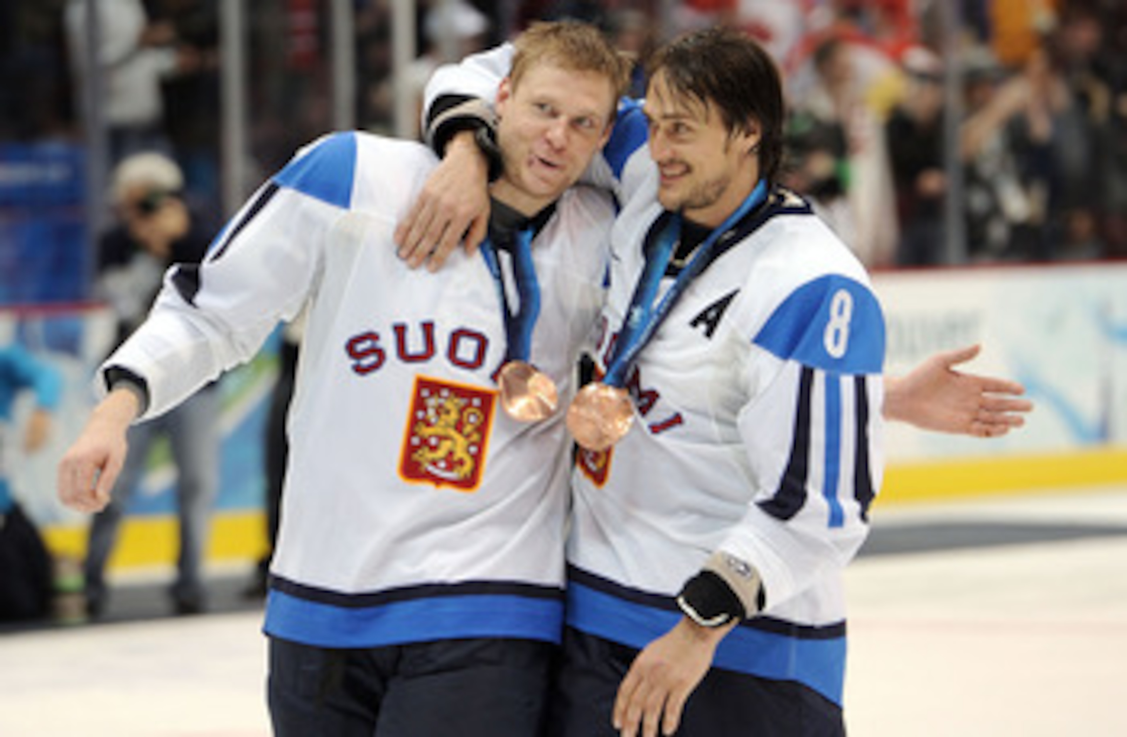 VANCOUVER, BC - FEBRUARY 27: Mikko Koivu #9 and Teemu Selanne #8 of Finland celebrates with his bronze medal after the ice hockey men's bronze medal game between Finland and Slovakia on day 16 of the Vancouver 2010 Winter Olympics at Canada Hockey Place VANCOUVER, BC - FEBRUARY 27: Mikko Koivu #9 and Teemu Selanne #8 of Finland celebrates with his bronze medal after the ice hockey men's bronze medal game between Finland and Slovakia on day 16 of the Vancouver 2010 Winter Olympics at Canada Hockey Place