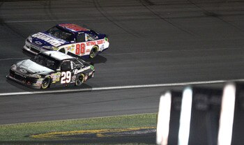 CONCORD, NC - MAY 29: Kevin Harvick, driver of the #29 Budweiser/Armed Forces Chevrolet, races with Dale Earnhardt Jr,, driver of the #88 National Guard / AMP Energy Cherolet, during the NASCAR Sprint Cup Series Coca-Cola 600 at Charlotte Motor Speedway o
