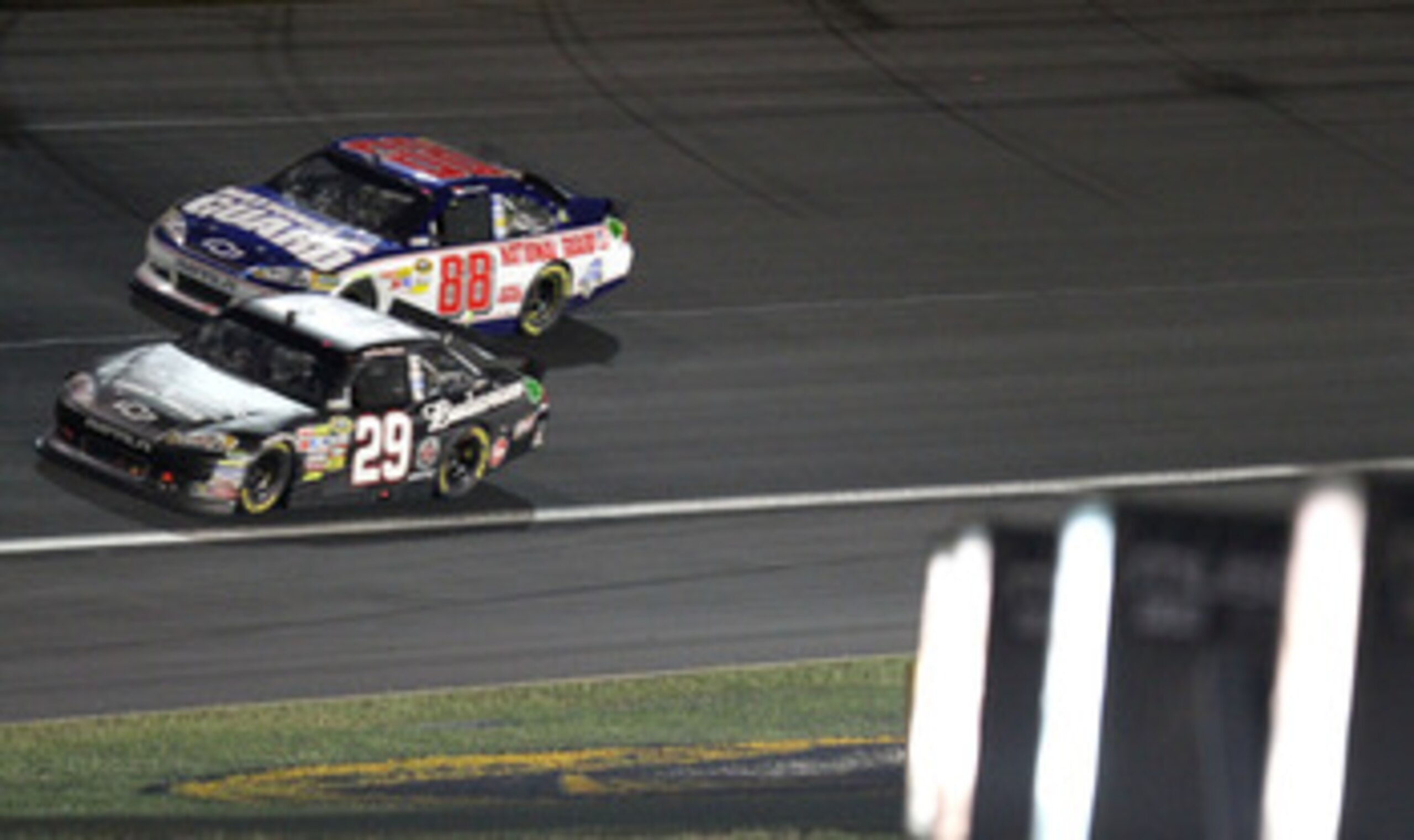 CONCORD, NC - MAY 29: Kevin Harvick, driver of the #29 Budweiser/Armed Forces Chevrolet, races with Dale Earnhardt Jr,, driver of the #88 National Guard / AMP Energy Cherolet, during the NASCAR Sprint Cup Series Coca-Cola 600 at Charlotte Motor Speedway o