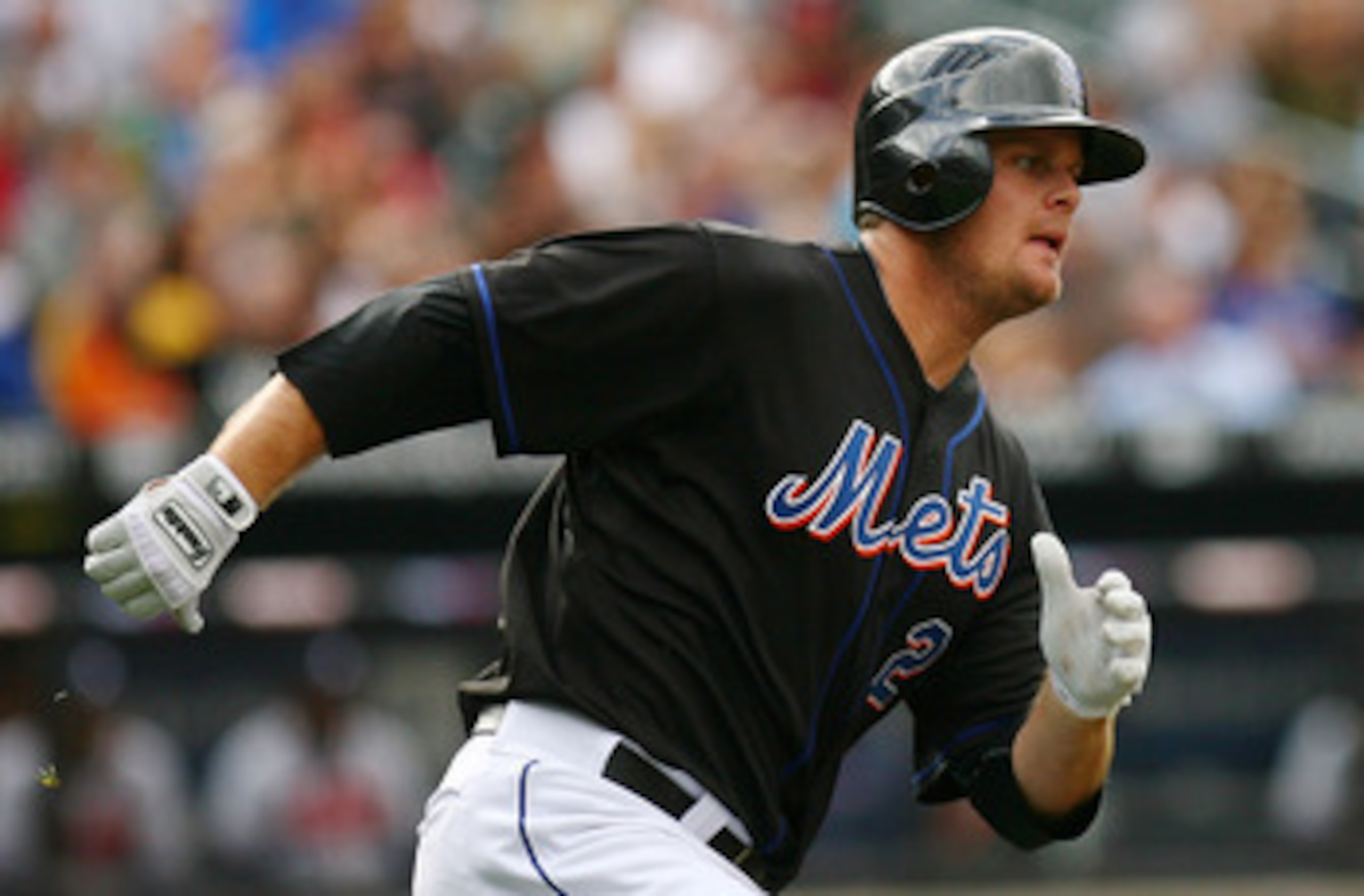 NEW YORK - SEPTEMBER 18:  Lucas Duda #21 of the New York Mets runs against the Atlanta Braves on September 18, 2010 at Citi Field in the Flushing neighborhood of the Queens borough of New York City.  (Photo by Andrew Burton/Getty Images)