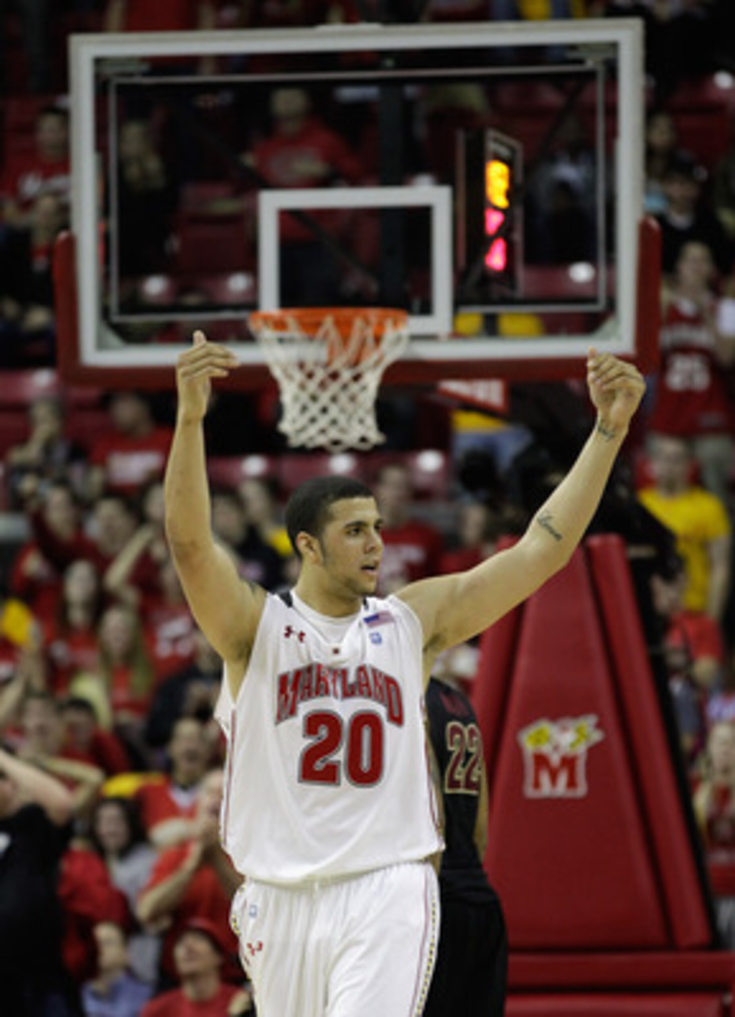 COLLEGE PARK, MD - FEBRUARY 23: Jordan Williams #20 of the Maryland Terrapins celebrates against the Florida State Seminoles at the Comast Center on February 23, 2011 in College Park, Maryland.  (Photo by Rob Carr/Getty Images)