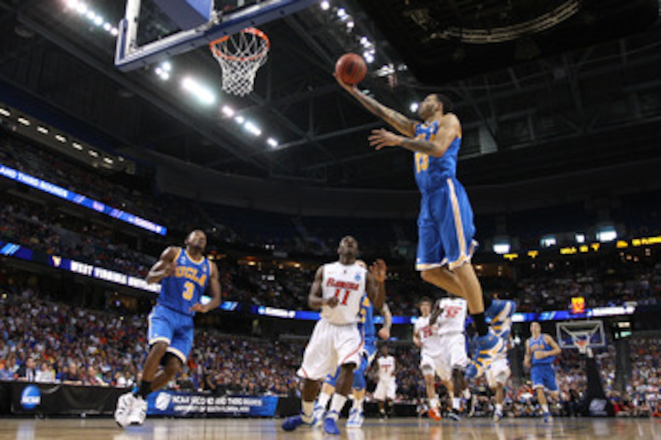 TAMPA, FL - MARCH 19:  Tyler Honeycutt #23 of the UCLA Bruins drives for a shot attempt against the Florida Gators during the third round of the 2011 NCAA men's basketball tournament at St. Pete Times Forum on March 19, 2011 in Tampa, Florida.  (Photo by 