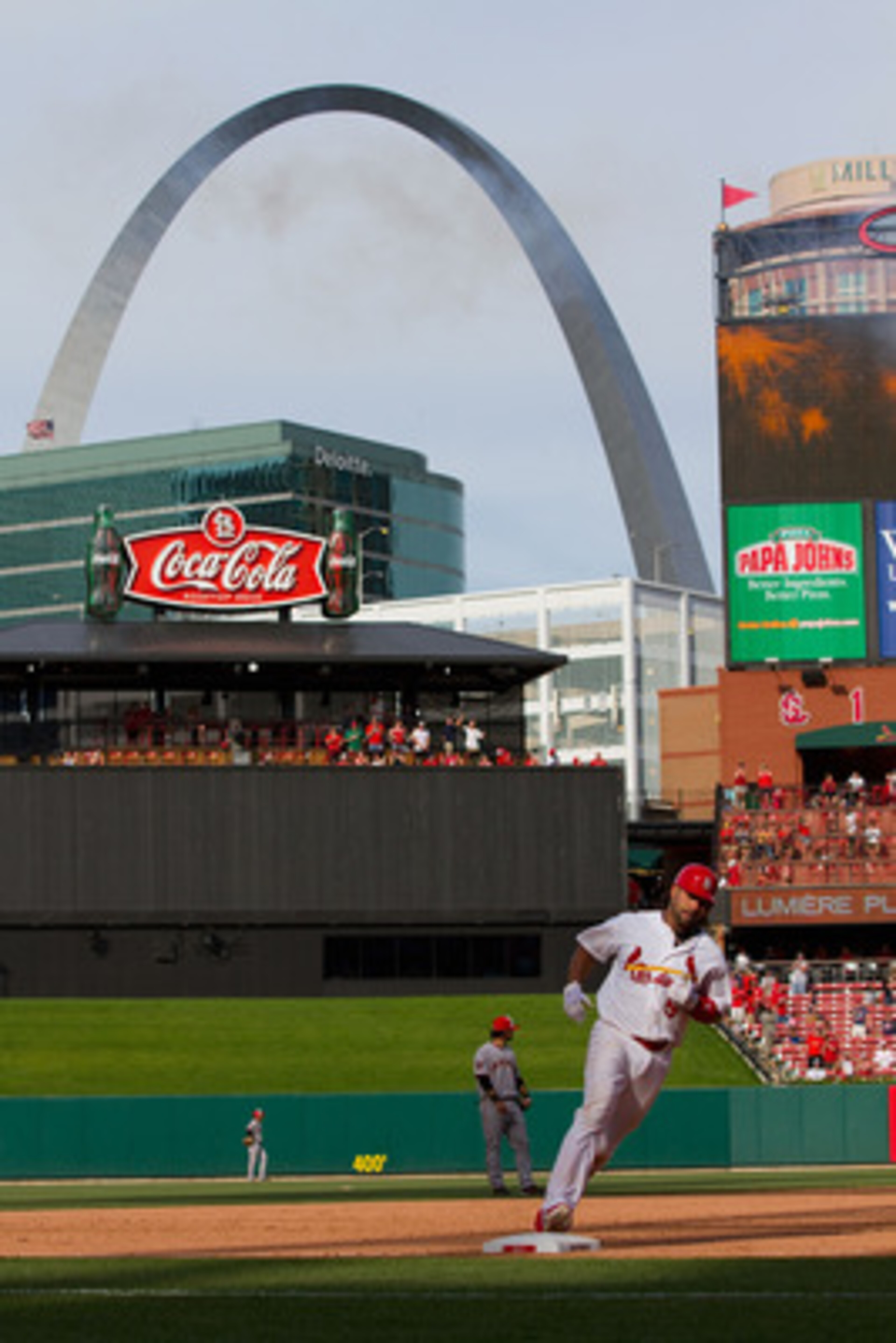 ST. LOUIS, MO - MAY 30: Albert Pujols #5 of the St. Louis Cardinals rounds the bases after hitting a solo home run against the San Francisco Giants at Busch Stadium on May 30, 2011 in St. Louis, Missouri.  (Photo by Dilip Vishwanat/Getty Images)