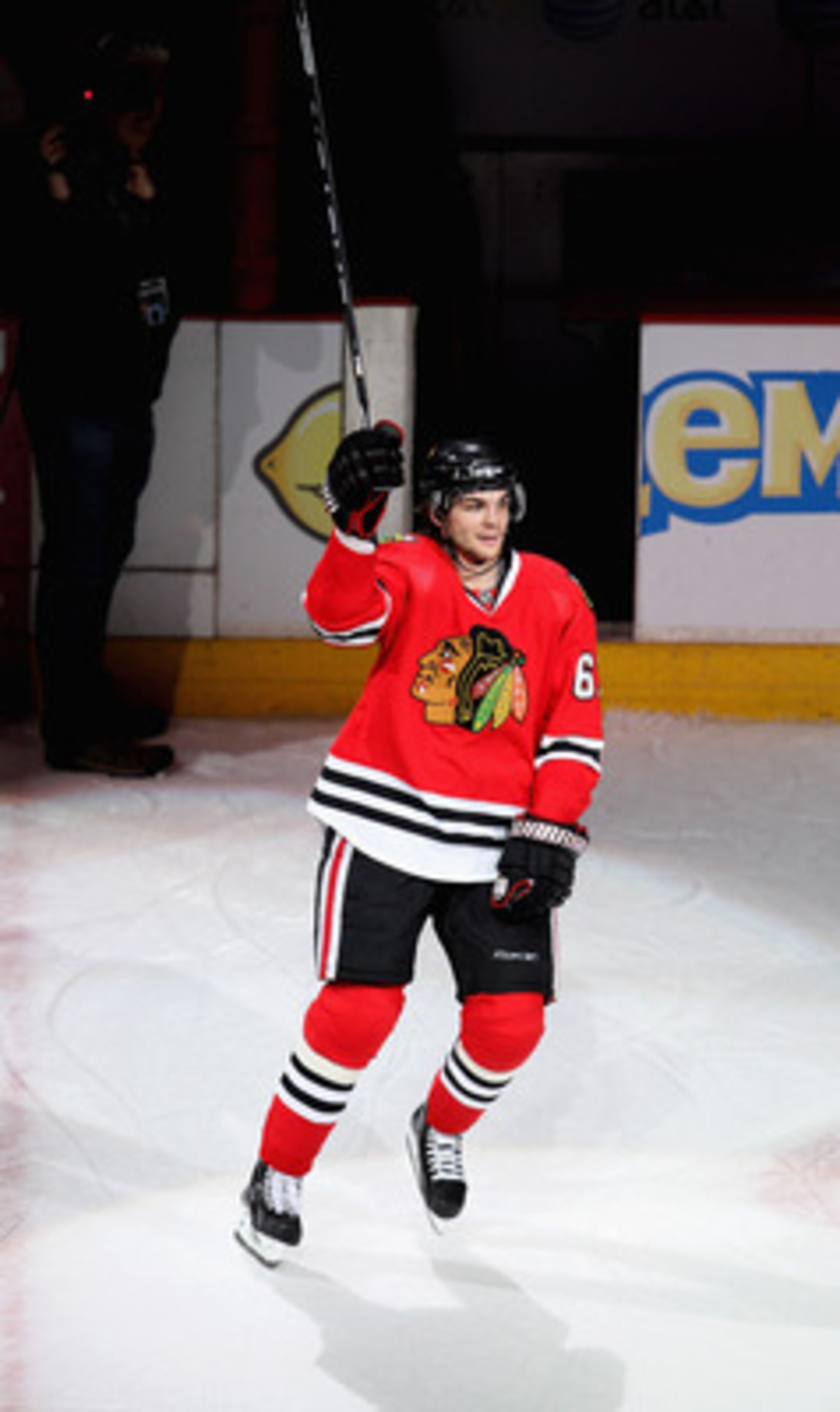 CHICAGO, IL - APRIL 19: Michael Frolik #67 of the Chicago Blackhawks salutes the crowd after a win over the Vancouver Canucks in Game Four of the Western Conference Quarterfinals during the 2011 NHL Stanley Cup Playoffs at the United Center on April 19, 2 CHICAGO, IL - APRIL 19: Michael Frolik #67 of the Chicago Blackhawks salutes the crowd after a win over the Vancouver Canucks in Game Four of the Western Conference Quarterfinals during the 2011 NHL Stanley Cup Playoffs at the United Center on April 19, 2