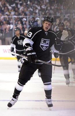 LOS ANGELES, CA - APRIL 19:  Kyle Clifford #13 of the Los Angeles Kings celebrates after a goal in the first period of game three of the Western Conference Quarterfinals against the San Jose Sharks during the 2011 NHL Stanley Cup Playoffs at Staples Cente
