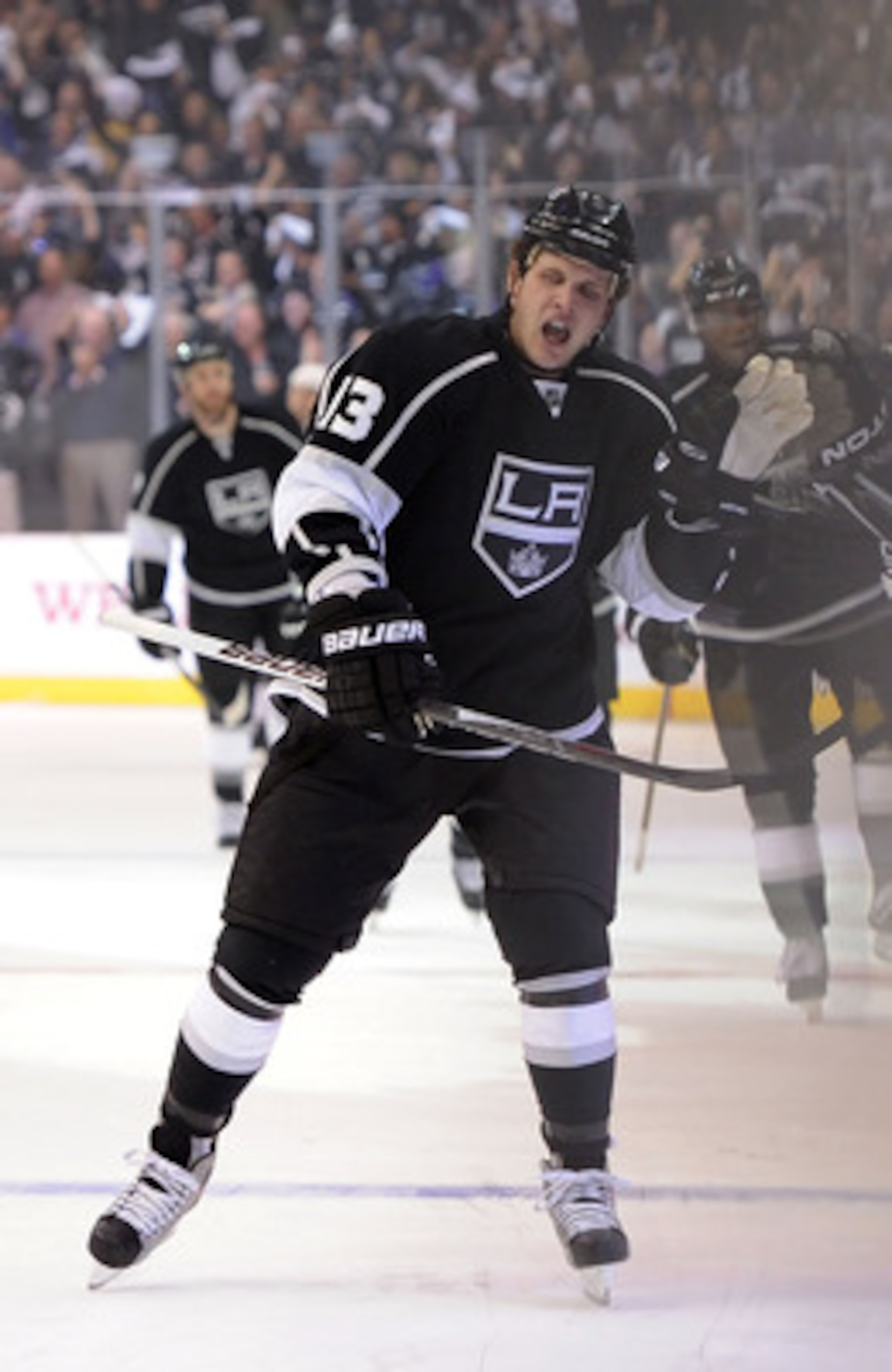 LOS ANGELES, CA - APRIL 19: Kyle Clifford #13 of the Los Angeles Kings celebrates after a goal in the first period of game three of the Western Conference Quarterfinals against the San Jose Sharks during the 2011 NHL Stanley Cup Playoffs at Staples Cente LOS ANGELES, CA - APRIL 19: Kyle Clifford #13 of the Los Angeles Kings celebrates after a goal in the first period of game three of the Western Conference Quarterfinals against the San Jose Sharks during the 2011 NHL Stanley Cup Playoffs at Staples Cente