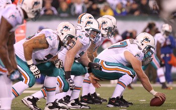 EAST RUTHERFORD, NJ - DECEMBER 12:  The Miami Dolphins offensive line against the New York Jets at New Meadowlands Stadium on December 12, 2010 in East Rutherford, New Jersey.  (Photo by Nick Laham/Getty Images)