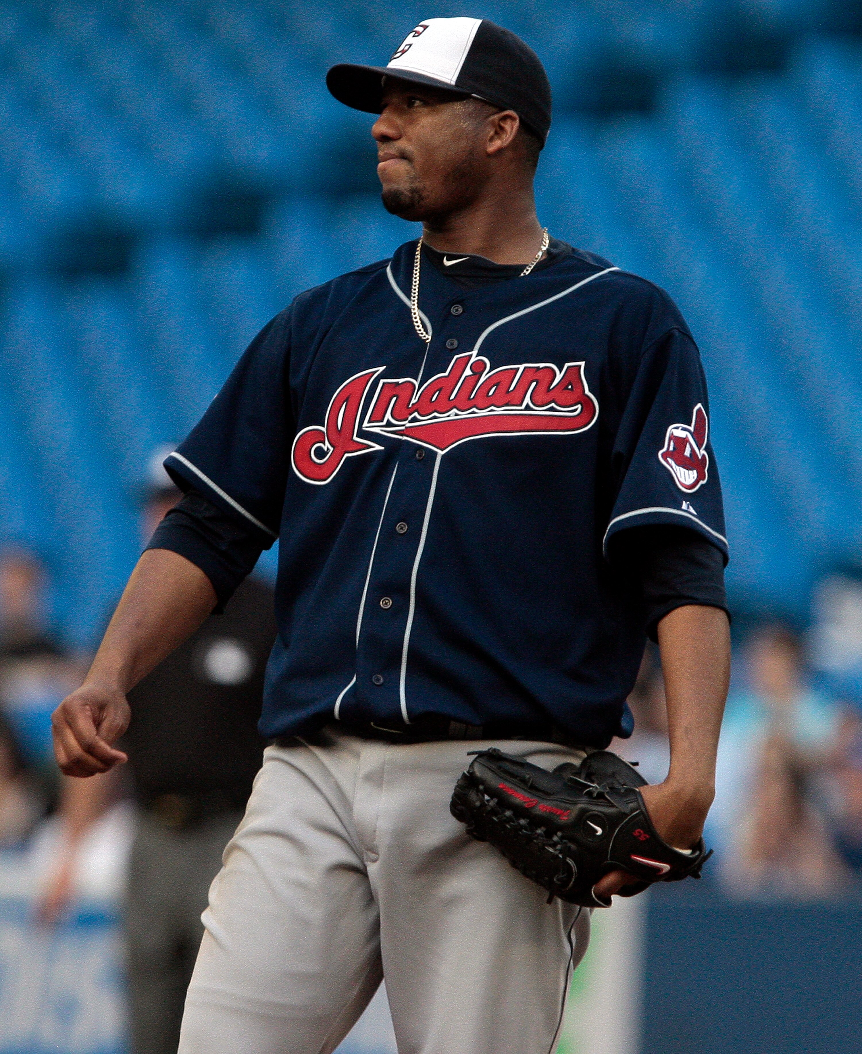 TORONTO, CANADA - MAY 30:  Pitcher Fausto Carmona #55 of the Cleveland Indians watches a two-run home run by Jayson Nix of  the Toronto Blue Jays leave the park during MLB action at Rogers Centre May 30, 2011 in Toronto, Ontario, Canada. (Photo by Abelima