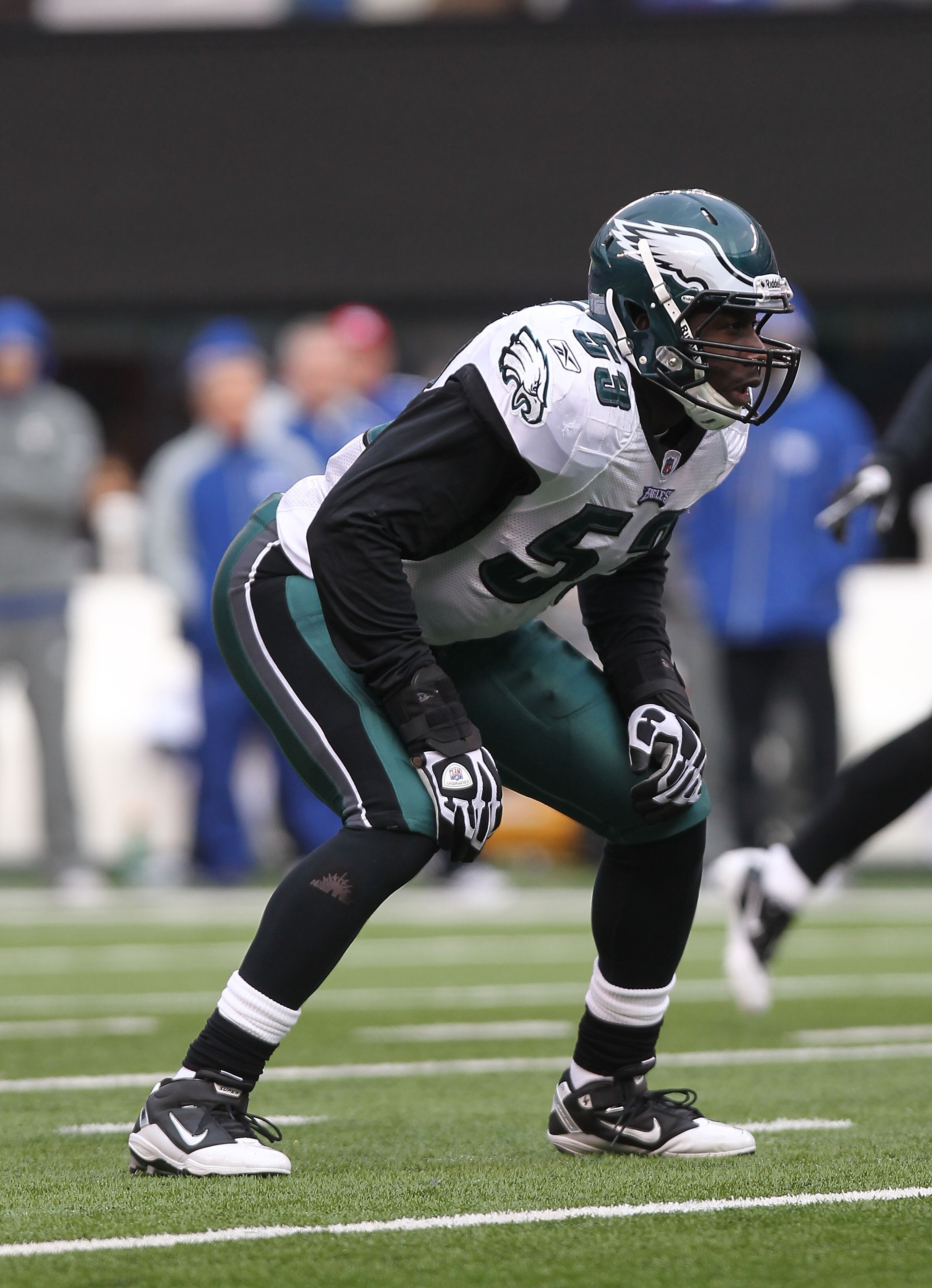 EAST RUTHERFORD, NJ - DECEMBER 19: Moise Fokou #53 of the Philadelphia Eagles against the New York Giants at New Meadowlands Stadium on December 19, 2010 in East Rutherford, New Jersey.  (Photo by Nick Laham/Getty Images)