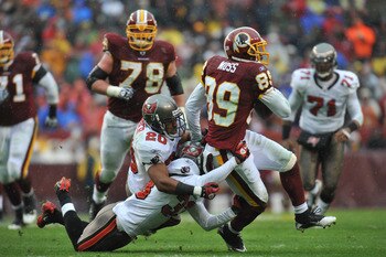 LANDOVER, MD - DECEMBER 12:  Santana Moss #89 of the Washington Redskins runs the ball after a catch during the game against the Tampa Bay Buccaneers  at FedExField on December 12, 2010 in Landover, Maryland. The Buccaneers defeated the Redskins 17-16. (P