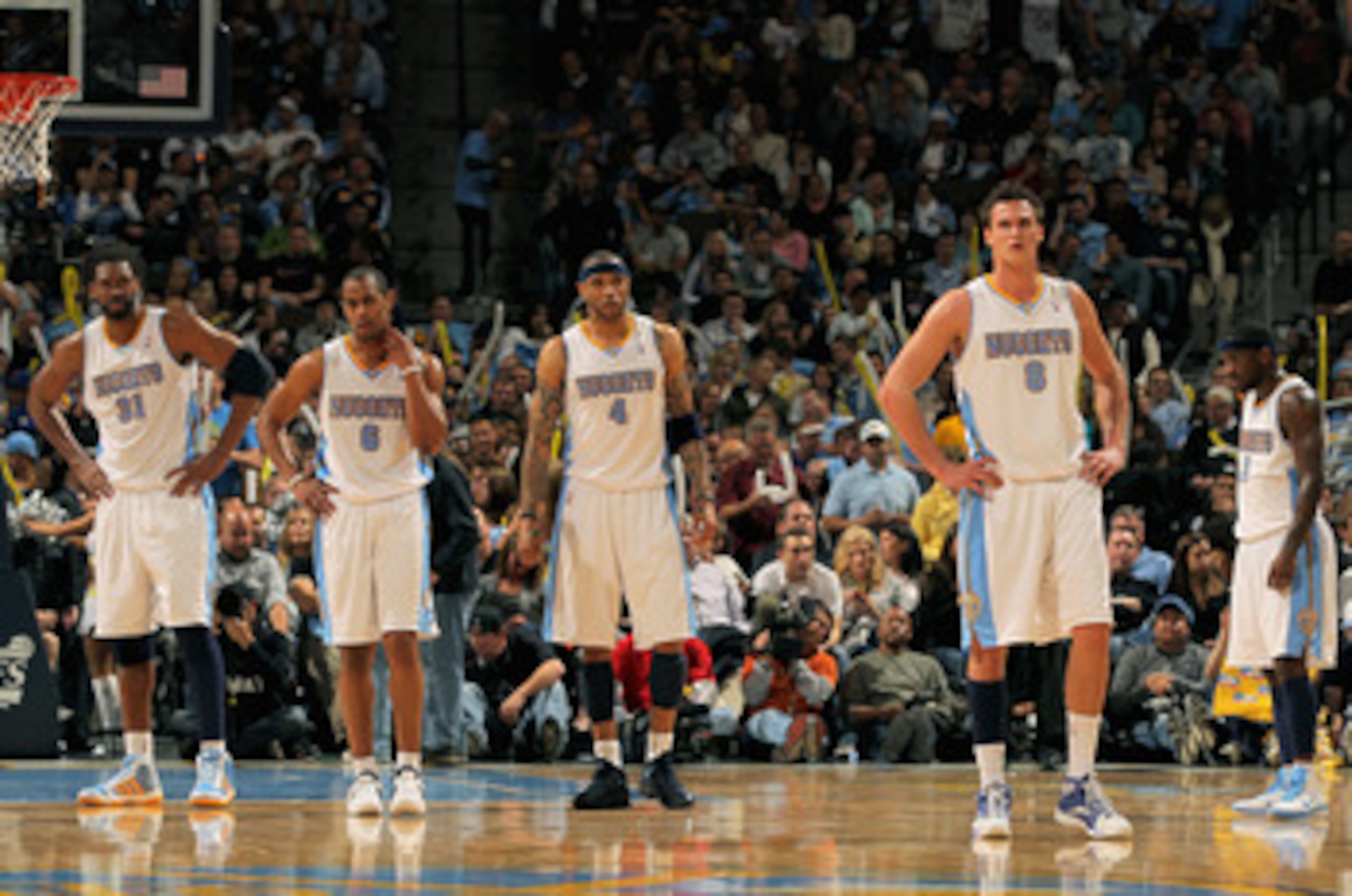 DENVER, CO - APRIL 23:  Nene Hilario #31, Arron Afflalo #6, Kenyon Martin #4, Danilo Gallinari #8 and Ty Lawson #3 of the Denver Nuggets look on as they await action against the Oklahoma City Thunder in Game Three of the Western Conference Quarterfinals i