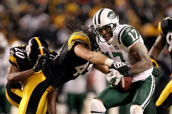 PITTSBURGH, PA - JANUARY 23:  Braylon Edwards #17 of the New York Jets is tackled by Troy Polamalu #43 of the Pittsburgh Steelers during the 2011 AFC Championship game at Heinz Field on January 23, 2011 in Pittsburgh, Pennsylvania.  (Photo by Ronald Marti