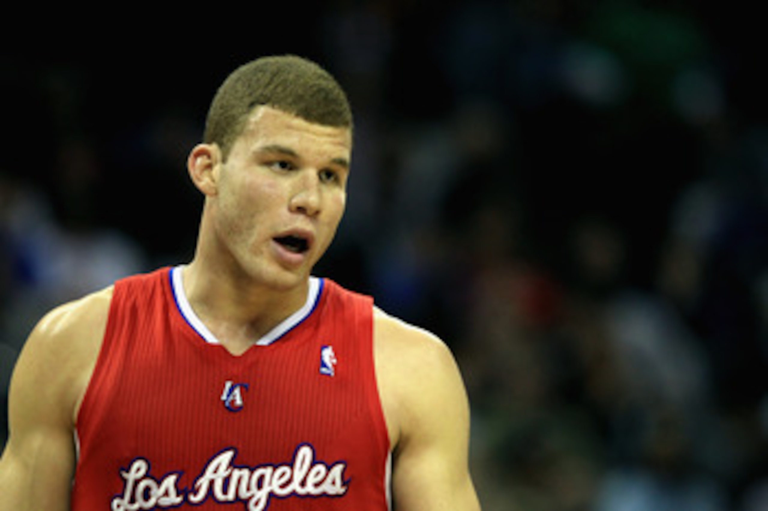 CHARLOTTE, NC - MARCH 07:  Blake Griffin #32 of the Los Angeles Clippers talks to a teamamte during their game against the Charlotte Bobcats at Time Warner Cable Arena on March 7, 2011 in Charlotte, North Carolina. NOTE TO USER: User expressly acknowledge