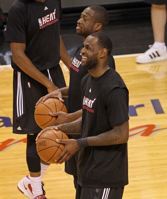 MIAMI, FL - MAY 30: Dwyane Wade #3 and LeBron James #6 of the Miami Heat laugh during practice before Game 1 of the 2011 NBA Finals against the Dallas Mavericks on May 30, 2011 at American Airlines Arena in Miami, Florida. NOTE TO USER: User expressly ack