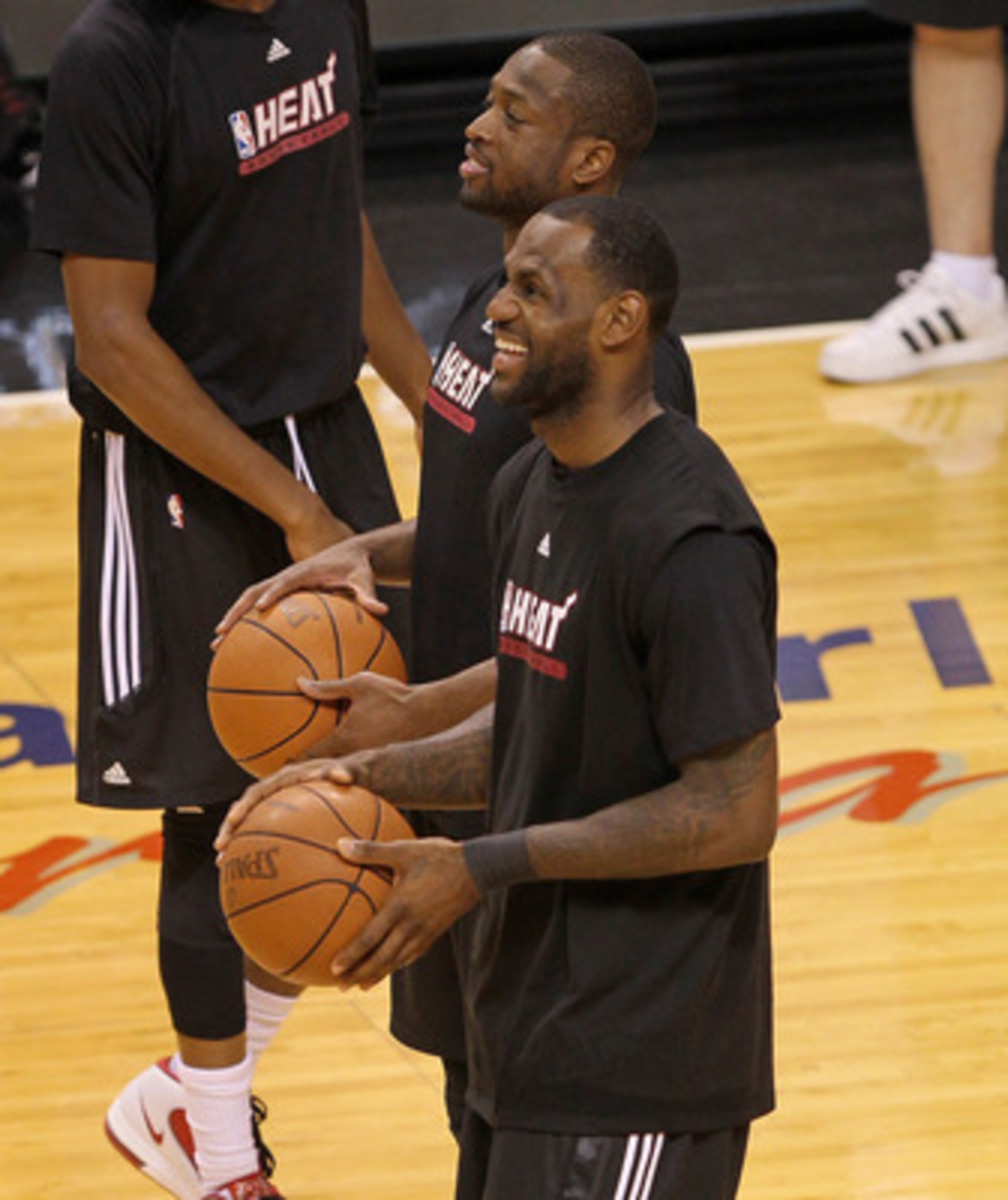MIAMI, FL - MAY 30: Dwyane Wade #3 and LeBron James #6 of the Miami Heat laugh during practice before Game 1 of the 2011 NBA Finals against the Dallas Mavericks on May 30, 2011 at American Airlines Arena in Miami, Florida. NOTE TO USER: User expressly ack