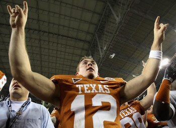 GLENDALE, AZ - JANUARY 05:  Quarterback Colt McCoy #12 of the Texas Longhorns celebrates after defeating the Ohio State Buckeyes in the Tostitos Fiesta Bowl Game on January 5, 2009 at University of Phoenix Stadium in Glendale, Arizona. The Longhorns defea