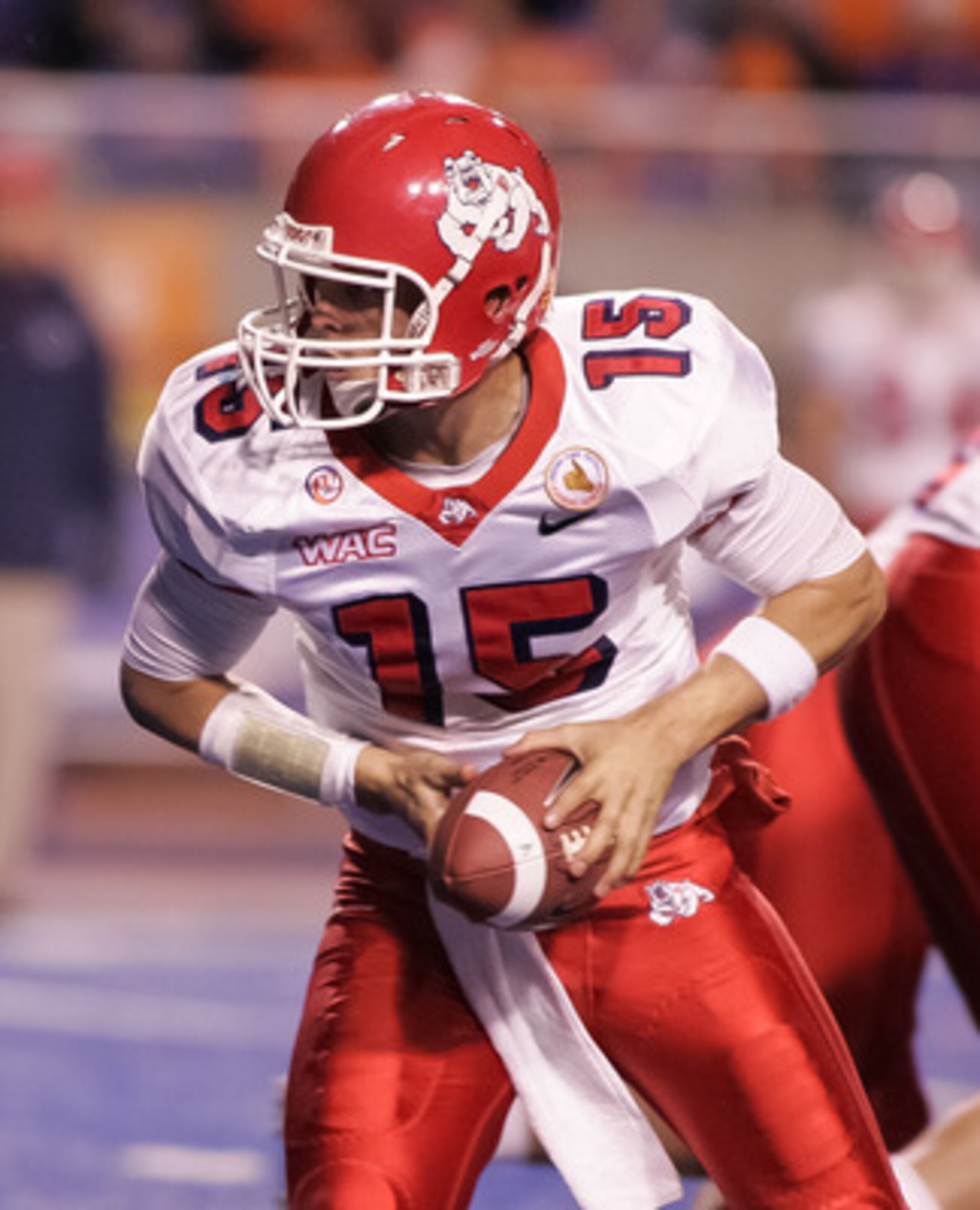 BOISE, ID - NOVEMBER 19: Ryan Colburn #15 of the Fresno State Bulldogs looks for the handoff against the Boise State Broncos at Bronco Stadium on November 19, 2010 in Boise, Idaho. (Photo by Otto Kitsinger III/Getty Images) BOISE, ID - NOVEMBER 19: Ryan Colburn #15 of the Fresno State Bulldogs looks for the handoff against the Boise State Broncos at Bronco Stadium on November 19, 2010 in Boise, Idaho. (Photo by Otto Kitsinger III/Getty Images)