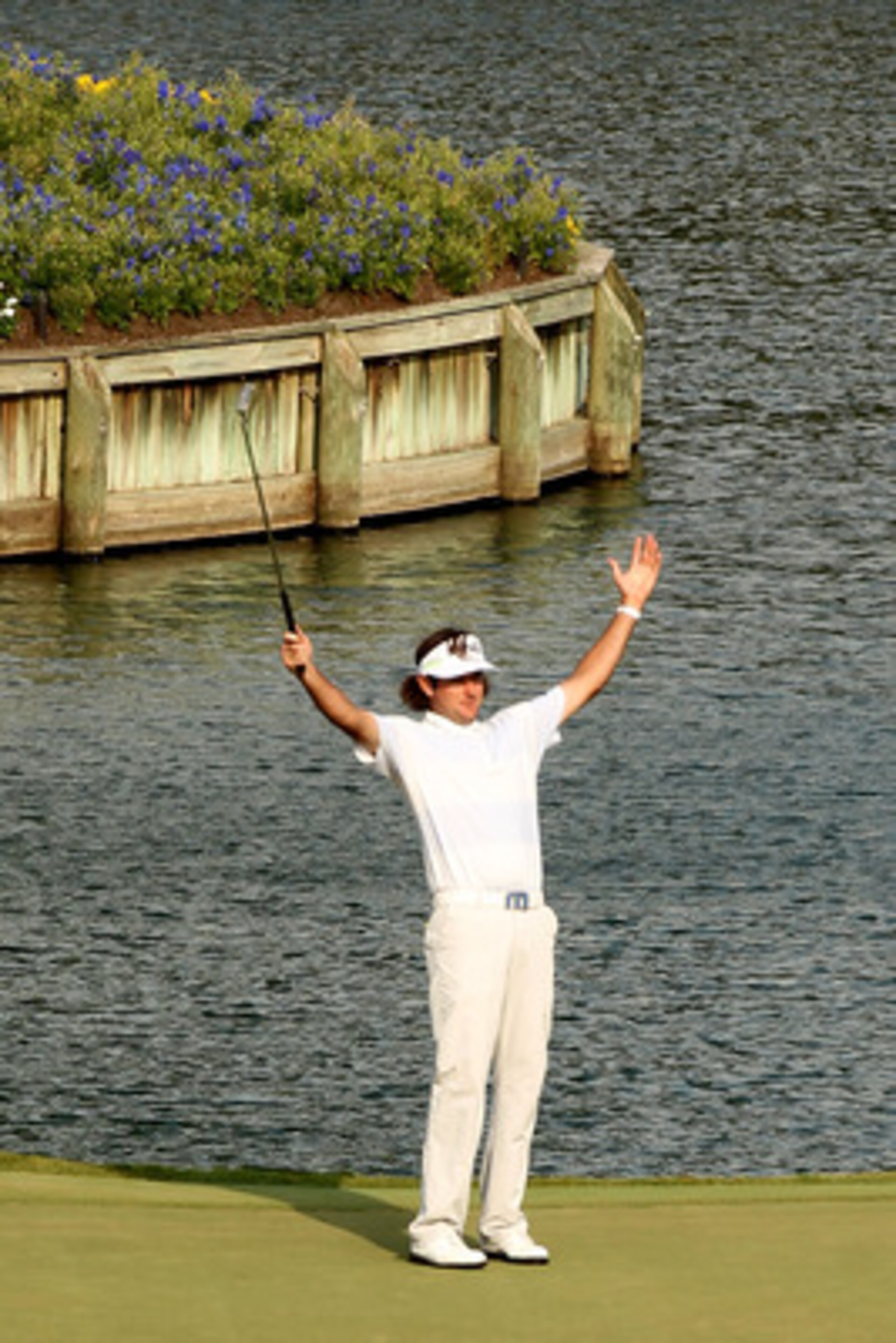 PONTE VEDRA BEACH, FL - MAY 13:  Bubba Watson celebrates chipping in for birdie on the 17th hole during the second round of THE PLAYERS Championship held at THE PLAYERS Stadium course at TPC Sawgrass on May 13, 2011 in Ponte Vedra Beach, Florida.  (Photo 