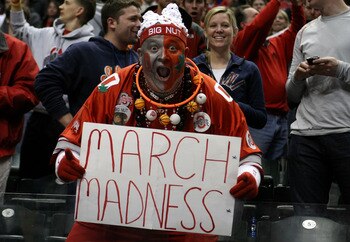 INDIANAPOLIS, IN - MARCH 13:  John 'Big Nut' Peters, fan of the Ohio State Buckeyes holds up a sign which reads 'March Madness' after they won 71-60 against the Penn State Nittany Lions during the championship game of the 2011 Big Ten Men's Basketball Tou