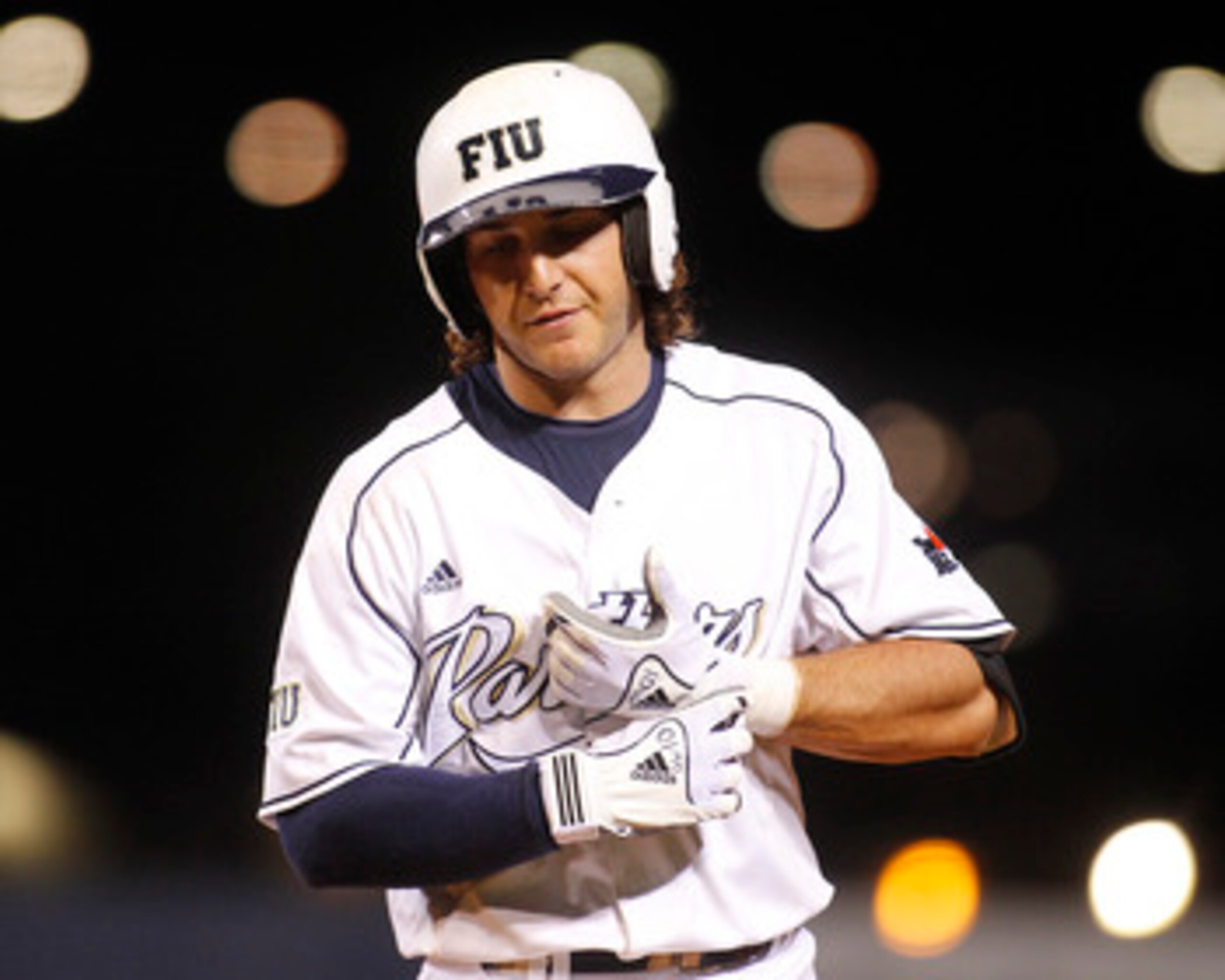 MIAMI, FL - FEBRUARY 18: Garrett Wittels #10 of the Florida International Panthers reacts to hitting into a fielders choice in the sixth inning. He was held without a hit by the Southeastern Louisiana Lions on February 18, 2011 at the FIU Baseball Stadium