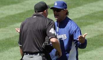 LOS ANGELES, CA - MAY 29:  Los Angeles Dodgers manager Don Mattingly (R) argues with home plate umpire Ron Kulpa in the top of the fifth inning against the Florida Marlins at Dodger Stadium on May 29, 2011 in Los Angeles, California. The Dodgers defeated
