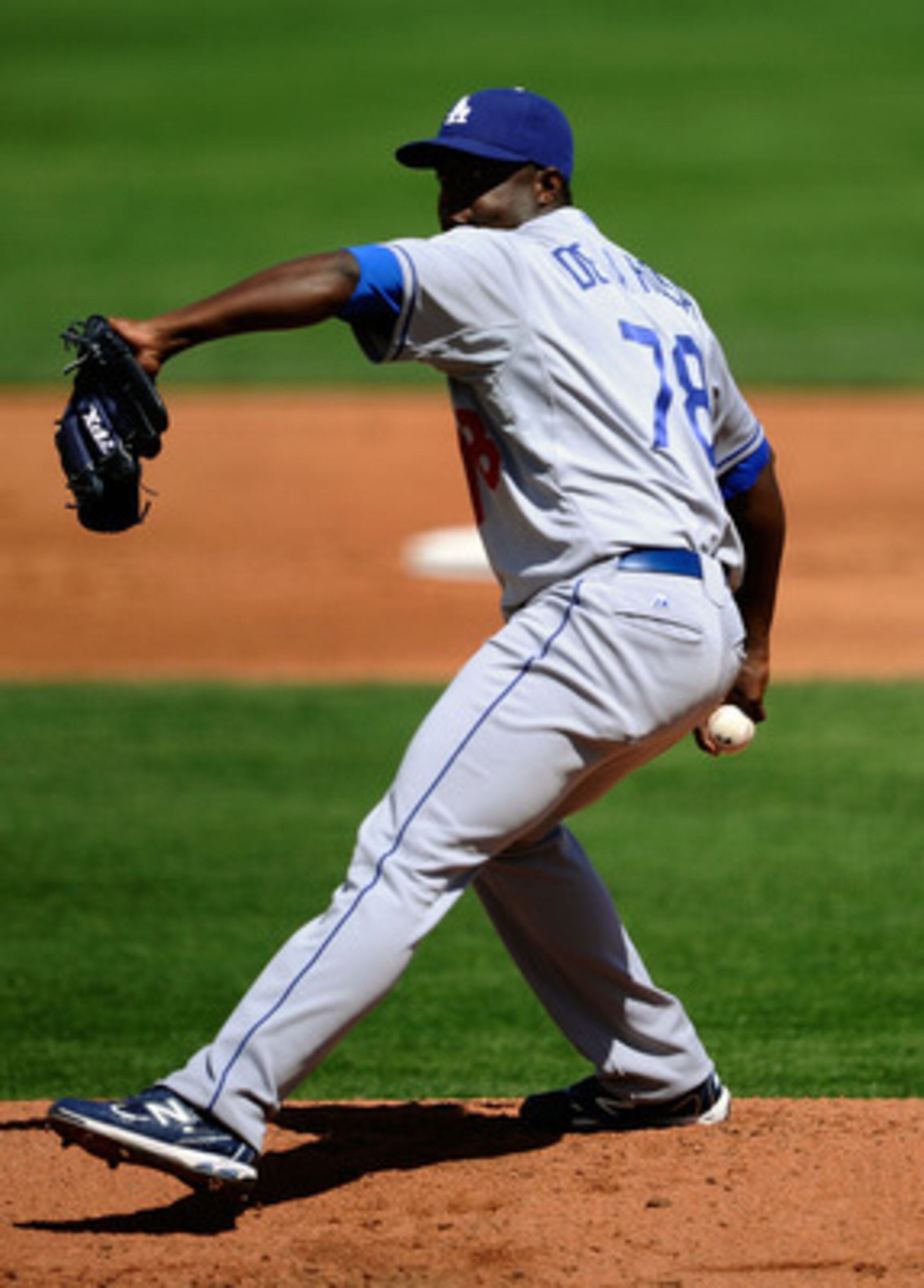 SCOTTSDALE, AZ - MARCH 18:  Pitcher Rubby De La Rosa #78 of the Los Angeles Dodgers throws against the San Francisco Giants during the spring training baseball game at Scottsdale Stadium on March 18, 2011 in Scottsdale, Arizona.  (Photo by Kevork Djansezi