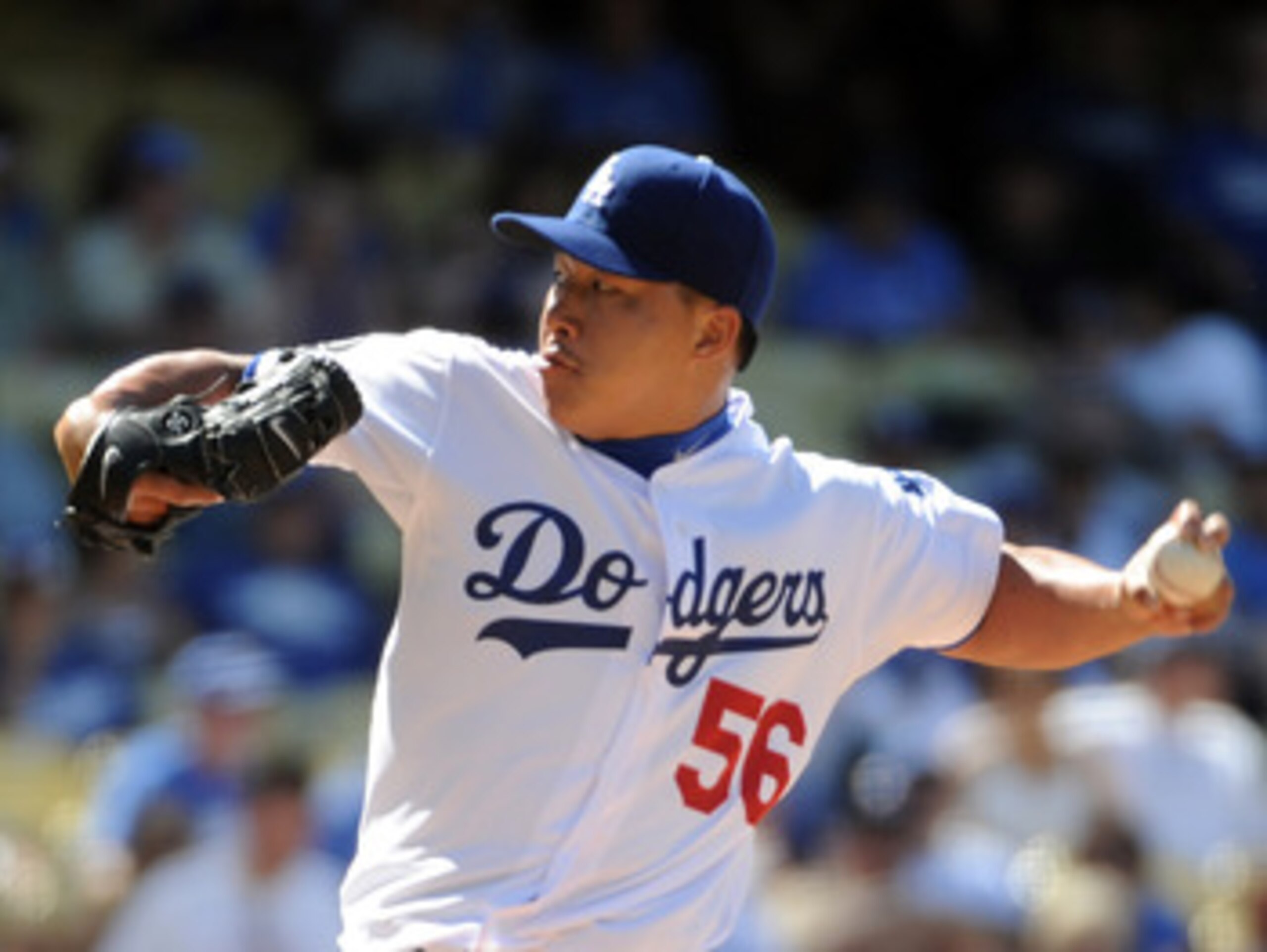LOS ANGELES, CA - MAY 01:  Hong-Chih Kuo #56 of the Los Angeles Dodgers pitches during the ninth inning against the San Diego Padres at Dodger Stadium on May 1, 2011 in Los Angeles, California.  (Photo by Harry How/Getty Images)