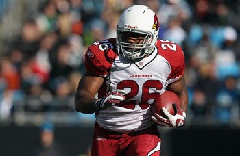 CHARLOTTE, NC - DECEMBER 19:  Beanie Wells #26 of the Arizona Cardinals runs with the ball against the Carolina Panthers during their game at Bank of America Stadium on December 19, 2010 in Charlotte, North Carolina.  (Photo by Streeter Lecka/Getty Images