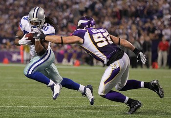 MINNEAPOLIS - OCTOBER 17:  Running back Marion Barber #24 of the Dallas Cowboys is pursued by Chad Greenway #52 of the Minnesota Vikings during the second quarter at Mall of America Field on October 17, 2010 in Minneapolis, Minnesota. The Vikings defeated