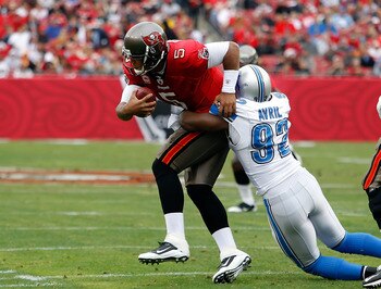 TAMPA, FL - DECEMBER 19:  Defensive end Cliff Avril #92 of the Detroit Lions sacks quarterback Josh Freeman #5 of the Tampa Bay Buccaneers during the game at Raymond James Stadium on December 19, 2010 in Tampa, Florida.  (Photo by J. Meric/Getty Images)