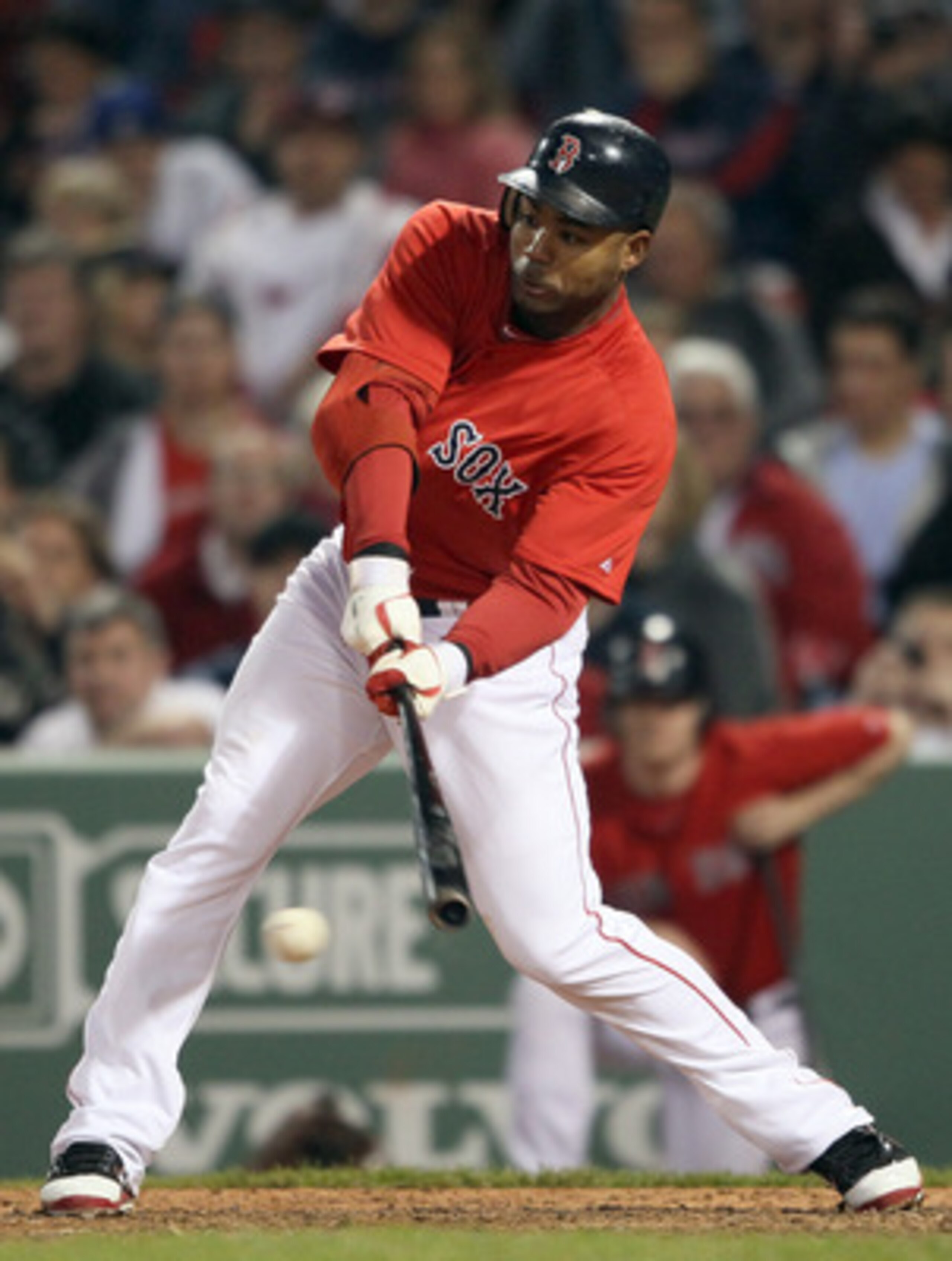 BOSTON, MA - MAY 20:  Carl Crawford #13 of the Boston Red Sox hits a 2RBI single on May 20, 2011 at Fenway Park in Boston, Massachusetts.on May 20, 2011 at Fenway Park in Boston, Massachusetts. The Chicago Cubs and the Boston Red Sox have not played at Fe