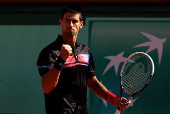 PARIS, FRANCE - MAY 25:  Novak Djokovic of Serbia celebrates a point during the men's singles round two match between Victor Hanescu of Romania and Novak Djokovic of Serbia on day four of the French Open at Roland Garros on May 25, 2011 in Paris, France. 