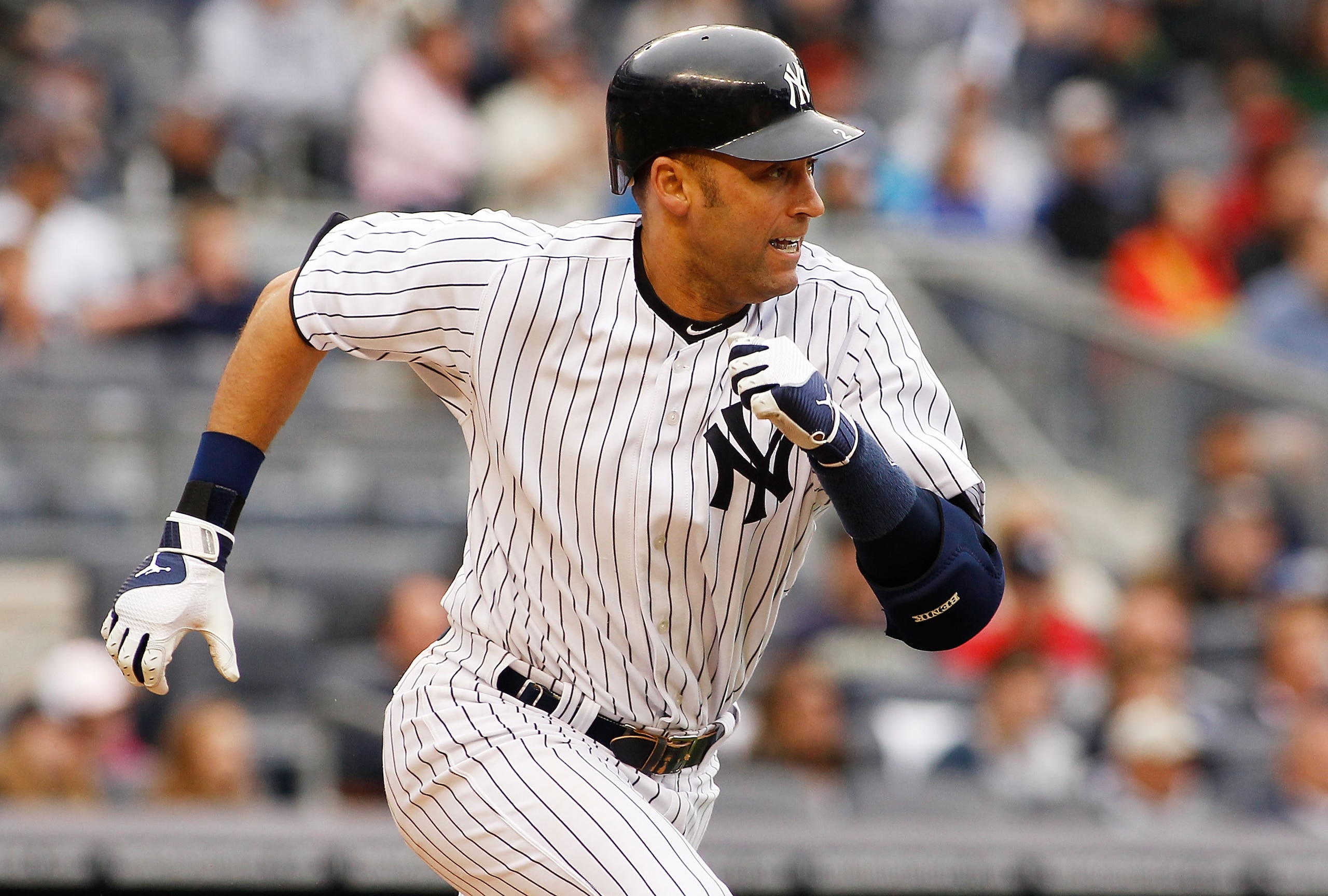 NEW YORK - MAY 22:  Derek Jeter #2 of the New York Yankees hits a two run single in the seventh inning to tie the game a three against the New York Mets on May 22, 2011 at Yankee Stadium in the Bronx borough of New York City. Yankees defeat the Mets 9-3.