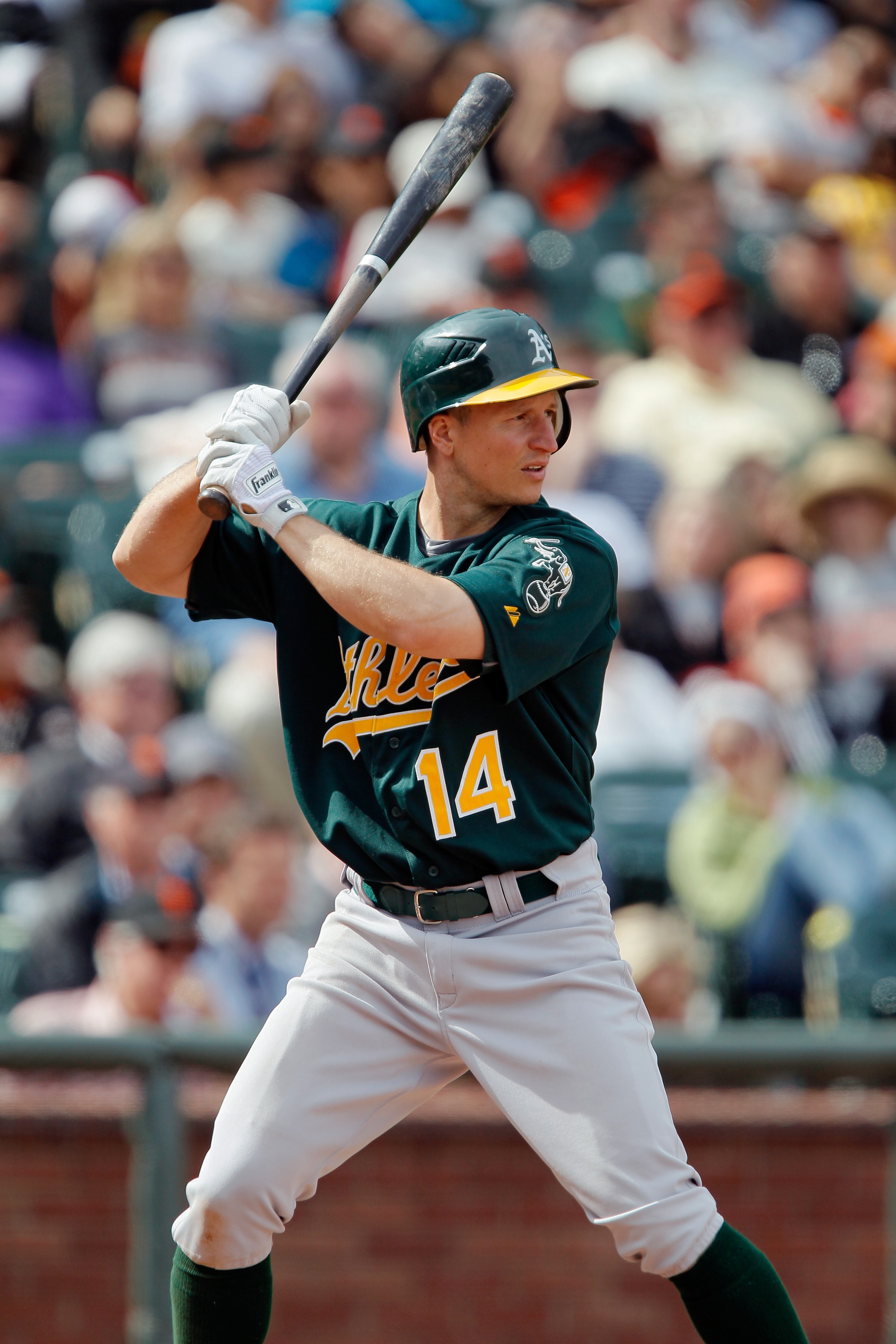 SAN FRANCISCO, CA - MAY 22:  Mark Ellis #14 of the Oakland A's bats against the San Francisco Giants at AT&T Park on May 22, 2011 in San Francisco, California.  The Giants won 5-4.  (Photo by Brian Bahr/Getty Images)