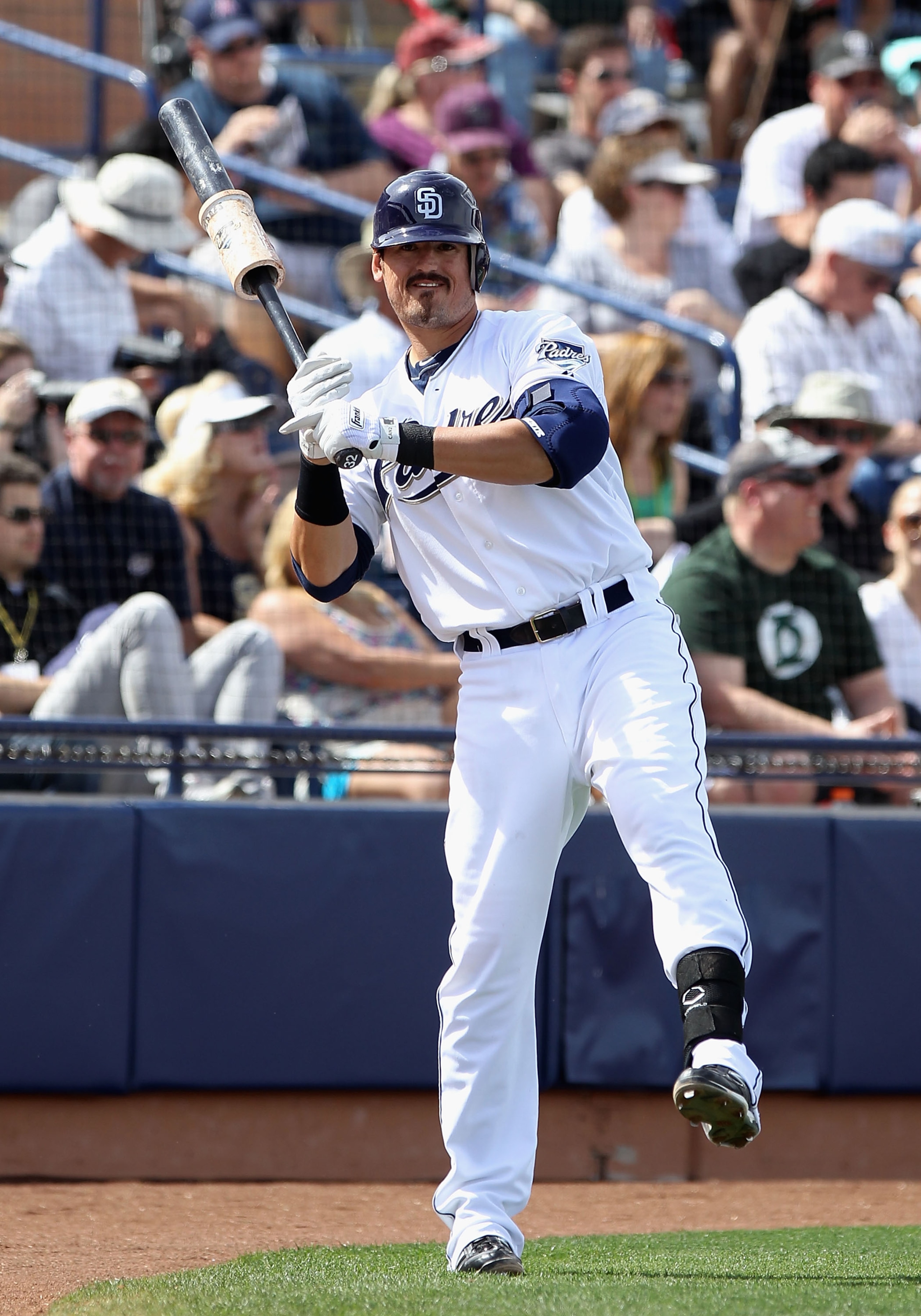 PEORIA, AZ - MARCH 06:  Jorge Cantu #32 of the San Diego Padres warms up on deck during the spring training game at Peoria Stadium on March 6, 2011 in Peoria, Arizona.  (Photo by Christian Petersen/Getty Images)