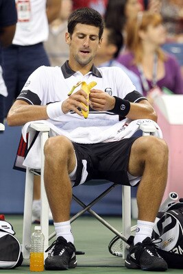 NEW YORK - SEPTEMBER 13:  Novak Djokovic of Serbia eats a banana during his men's singles final match against Rafael Nadal of Spain on day fifteen of the 2010 U.S. Open at the USTA Billie Jean King National Tennis Center on September 13, 2010 in the Flush