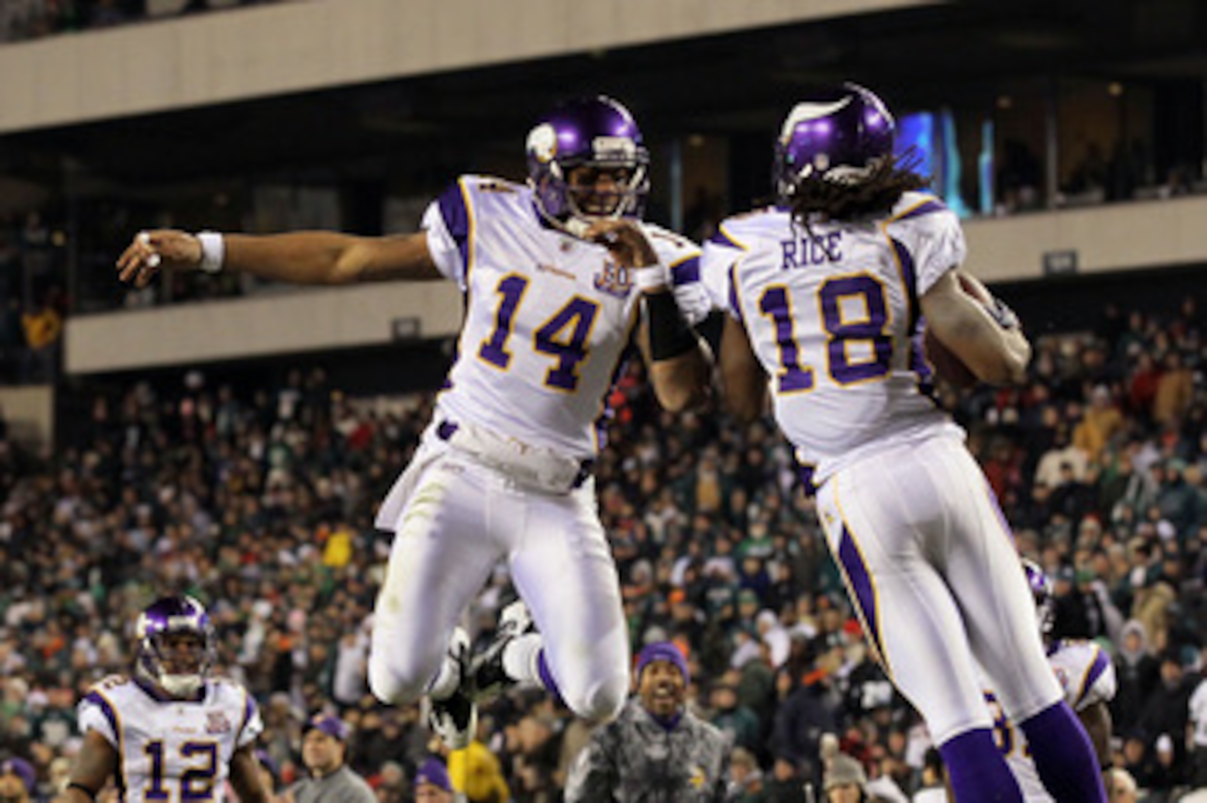 PHILADELPHIA, PA - DECEMBER 28: Joe Webb #14 and Sidney Rice #18 of the Minnesota Vikings celebrate after a play against the Philadelphia Eagles at Lincoln Financial Field on December 28, 2010 in Philadelphia, Pennsylvania. (Photo by Jim McIsaac/Getty Ima