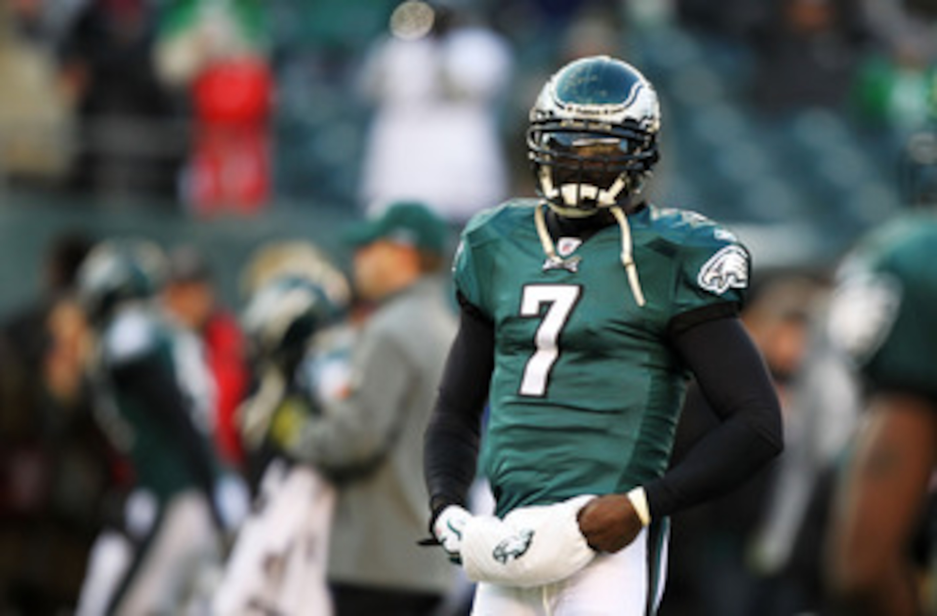 PHILADELPHIA, PA - JANUARY 09:  Michael Vick #7 of the Philadelphia Eagles walks on the field before playing against the Green Bay Packers in the 2011 NFC wild card playoff game at Lincoln Financial Field on January 9, 2011 in Philadelphia, Pennsylvania. 