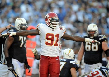 SAN DIEGO, CA - DECEMBER 12:  Tamba Hali #91 of the Kansas City Chiefs celebrates a stop on third down against the San Diego Chargers at Qualcomm Stadium on December 12, 2010 in San Diego, California.  (Photo by Harry How/Getty Images)