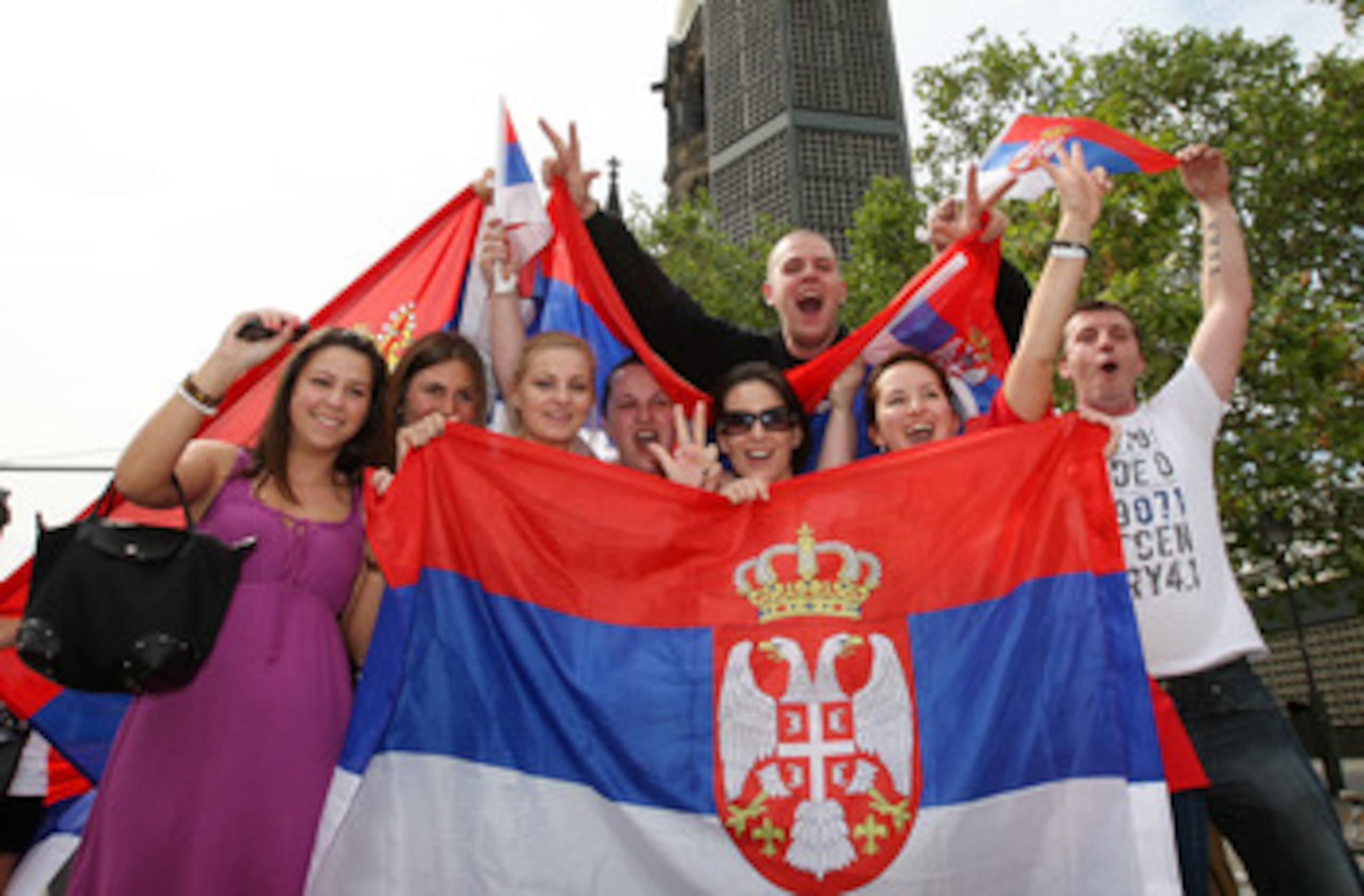 BERLIN - JUNE 18:  Football supporter of Serbia celebrate at Kurfuerstendamm after their team win the FIFA World Cup match between Germany and Serbia on June 18, 2010 in Berlin, Germany.  (Photo by Matthias Kern/Getty Images)