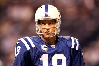 INDIANAPOLIS, IN - JANUARY 08:  Quarterback Peyton Manning #18 of the Indianapolis Colts looks on during warm ups against the New York Jets during their 2011 AFC wild card playoff game at Lucas Oil Stadium on January 8, 2011 in Indianapolis, Indiana.  (Ph