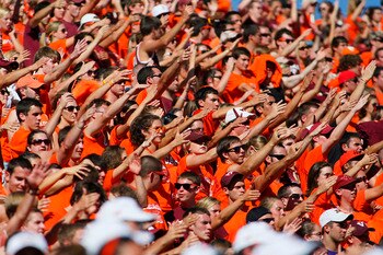 BLACKSBURG, VA - SEPTEMBER 18: Virginia Tech Hokies fans cheer against the East Carolina Pirates at Lane Stadium on September 18, 2010 in Blacksburg, Virginia.  (Photo by Geoff Burke/Getty Images)